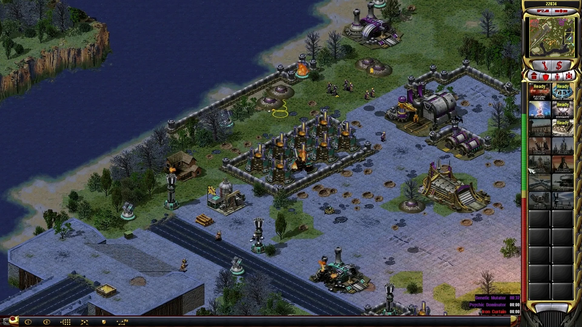 Screenshot of a fortified base with multiple buildings and defenses in Command & Conquer: Yuri's Revenge mod Yuri Resurgence Campaign