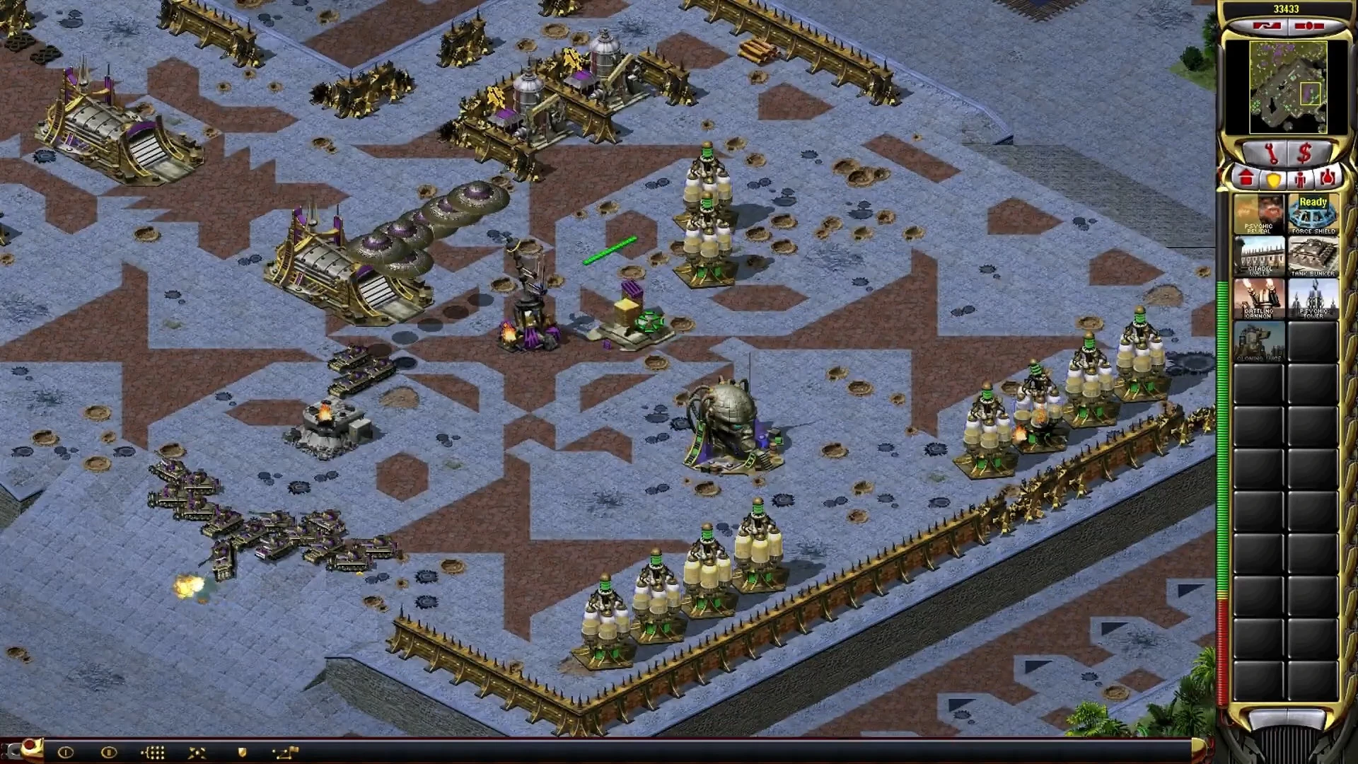 Game screenshot showing fortified base with multiple structures and tanks in Command & Conquer Yuri's Revenge Yuri Resurgence Campaign mod