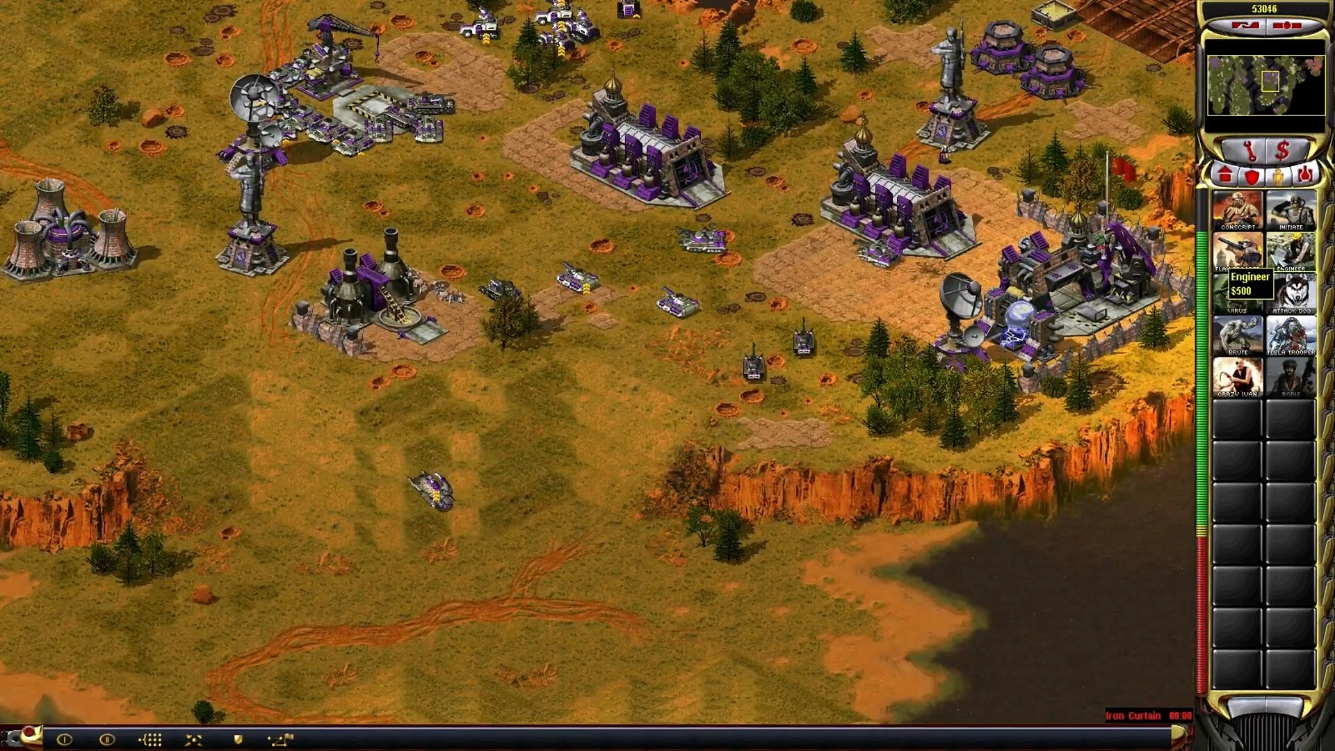 Top-down view of a Yuri faction base with buildings, tanks, and units in Command & Conquer Yuri's Revenge mod