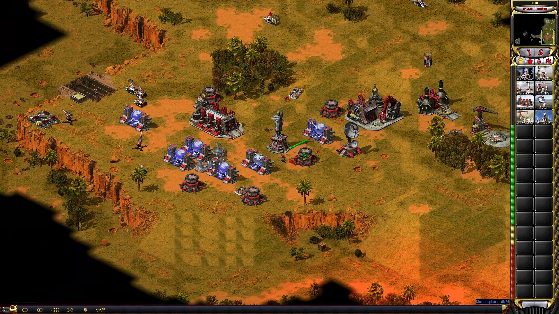 Gameplay de Command & Conquer Yuri's Revenge mostrando una base detallada con múltiples estructuras y unidades activas