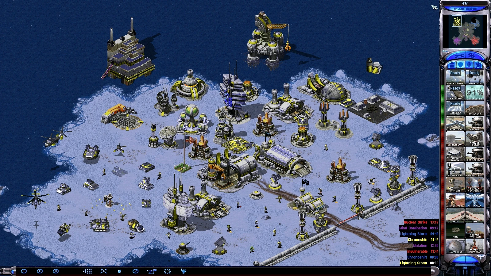 Screenshot einer verschneiten Inselbasis mit verschiedenen Gebäuden und Einheiten im Command & Conquer Yuri's Revenge Revolution Mod