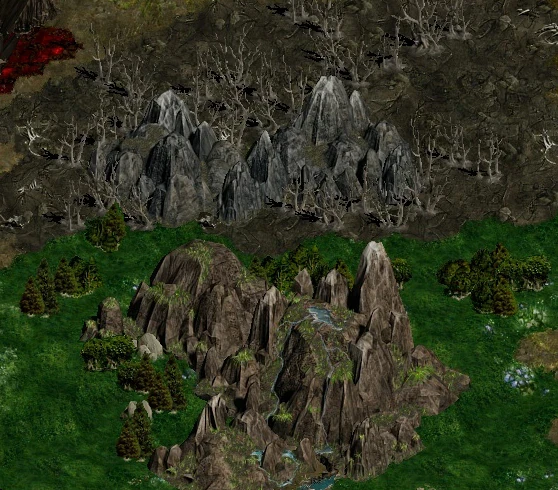 Screenshot of rocky mountain formations and green forest area from Disciples II Motlin Mod