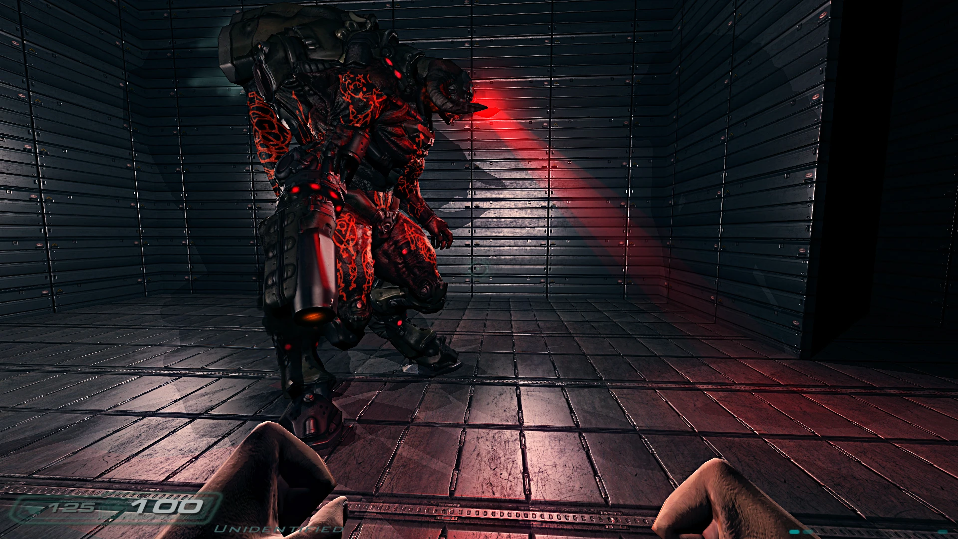 Vista en primera persona con puños frente a un Cyberdemon con ojos rojos brillantes en una sala metálica del mod Doom 3 Perfected