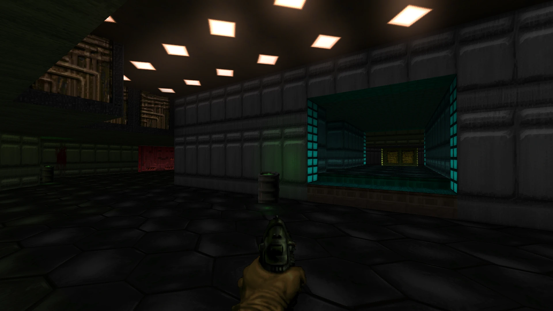 First-person view in Doom 64 mod Doom CE inside a dimly lit sci-fi corridor with pistol equipped