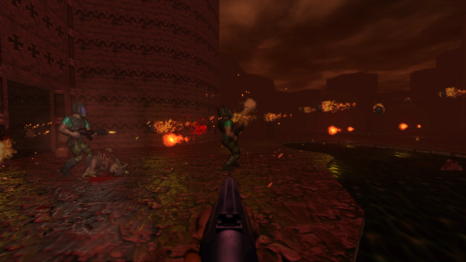 First-person view of shooting allies fighting demons near a large tower and river under dark sky in Doom CE