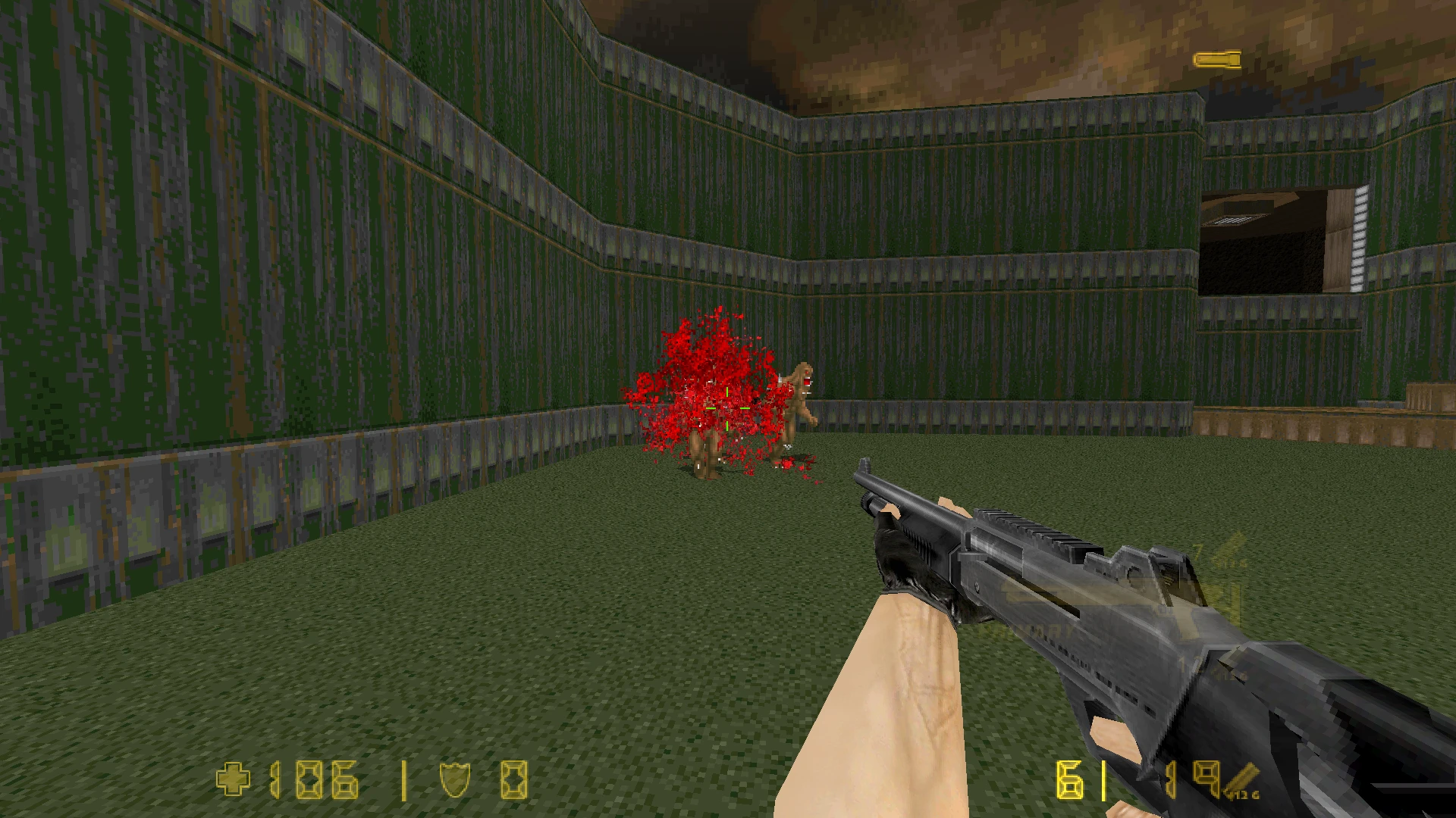 Un jugador en Doom II: Hell on Earth usa una escopeta para combatir demonios, mejorado por el addon Lambda-Strike HD Models. La escena muestra un demonio explotando en una ráfaga roja.