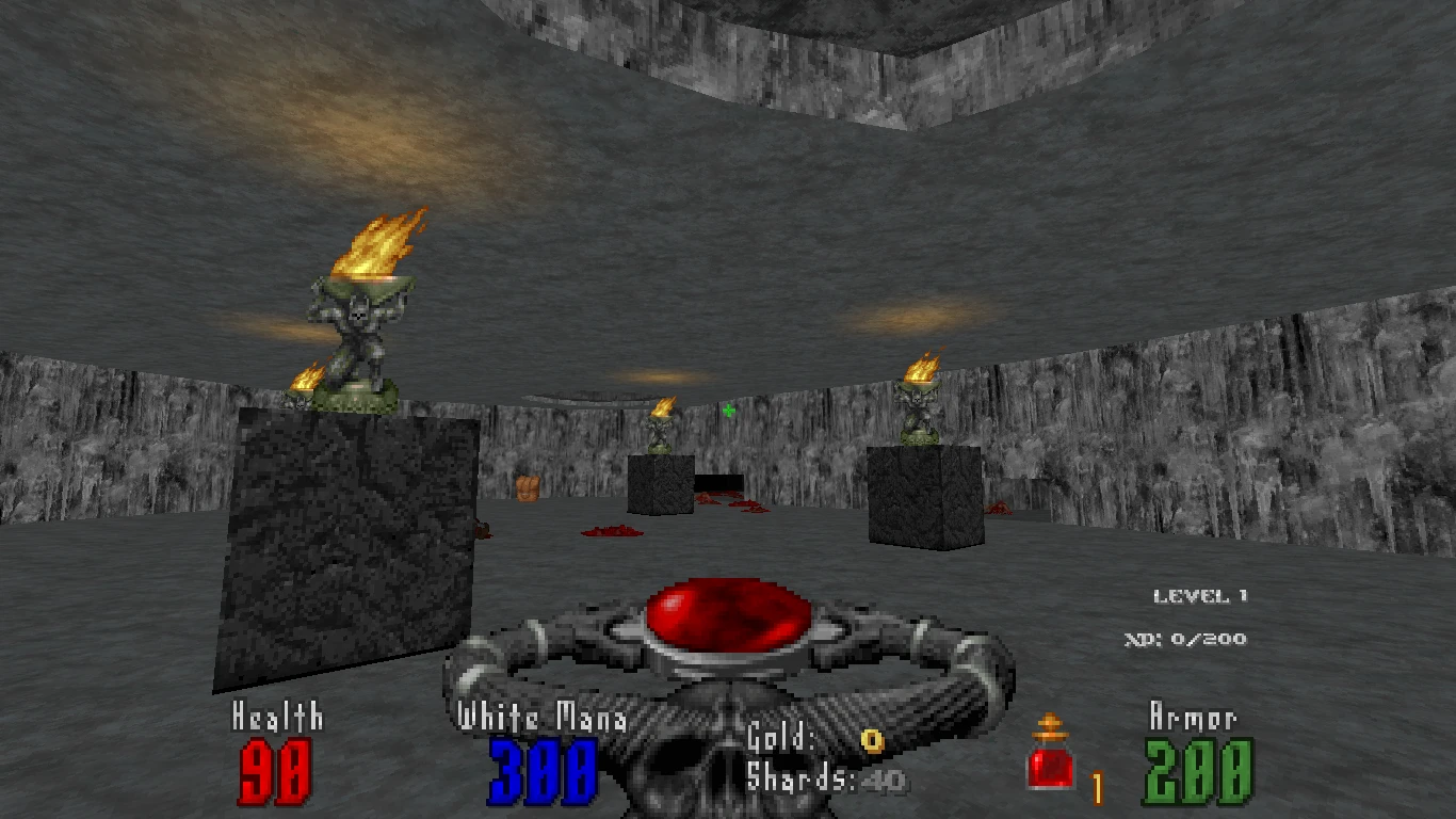 First-person view of a gray stone circular room with fiery statues on pedestals in Doom II Abysm 2 mod