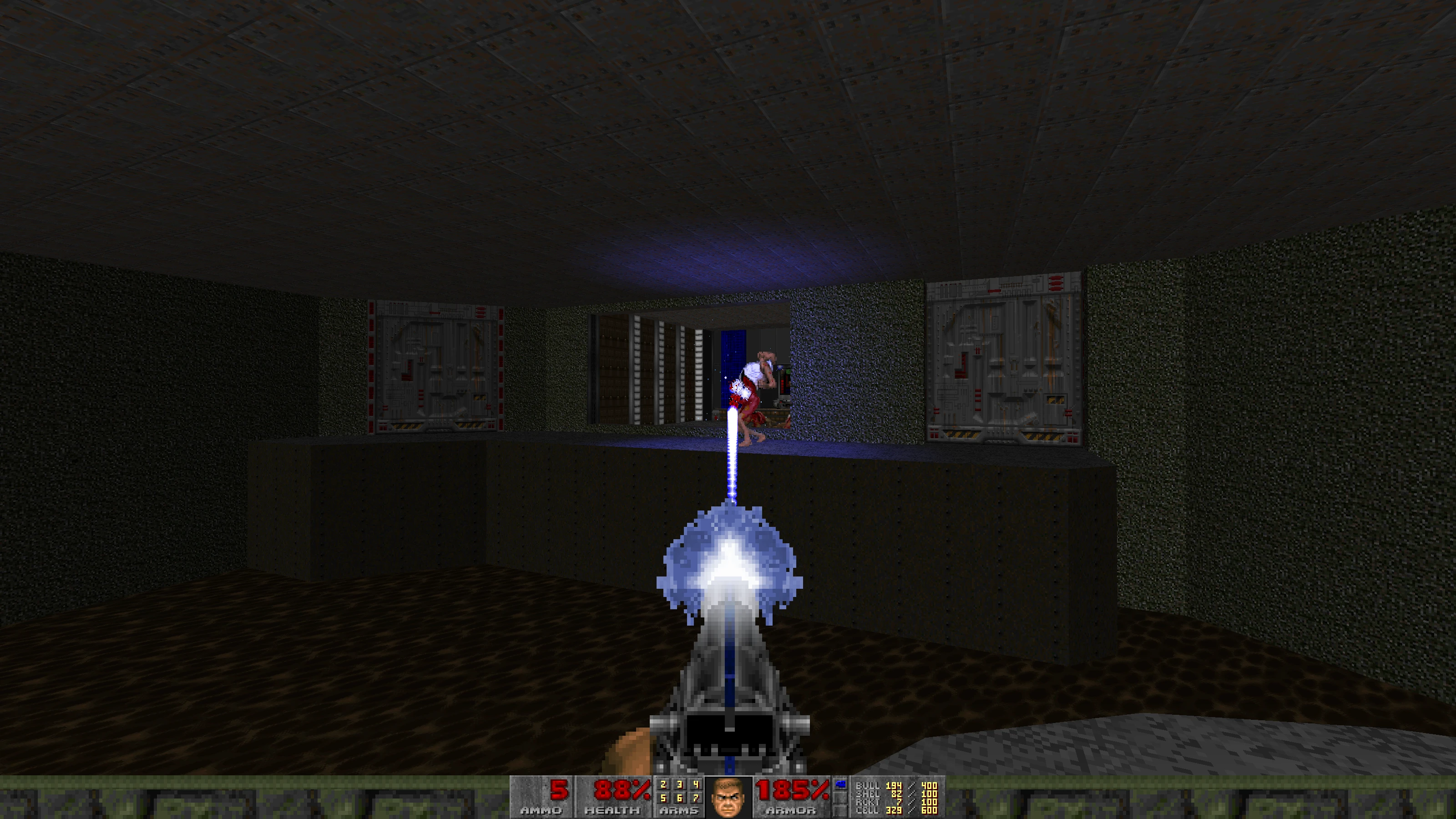 First-person view shooting a plasma bolt at a pink demon in a dark industrial setting in Doom II Babel mod