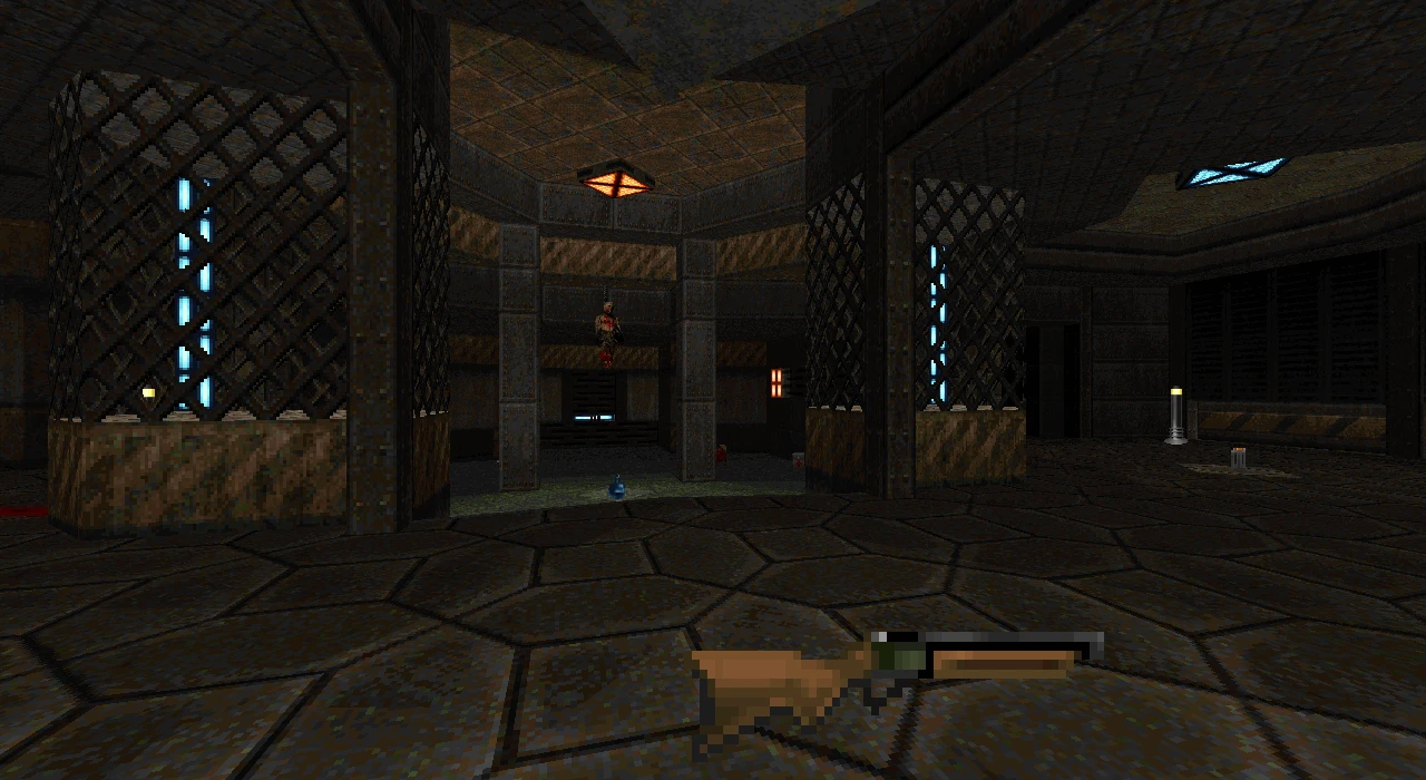 Vista de un pasillo futurista con paredes metálicas y arma en el suelo en el mod Back to Saturn X de Doom II
