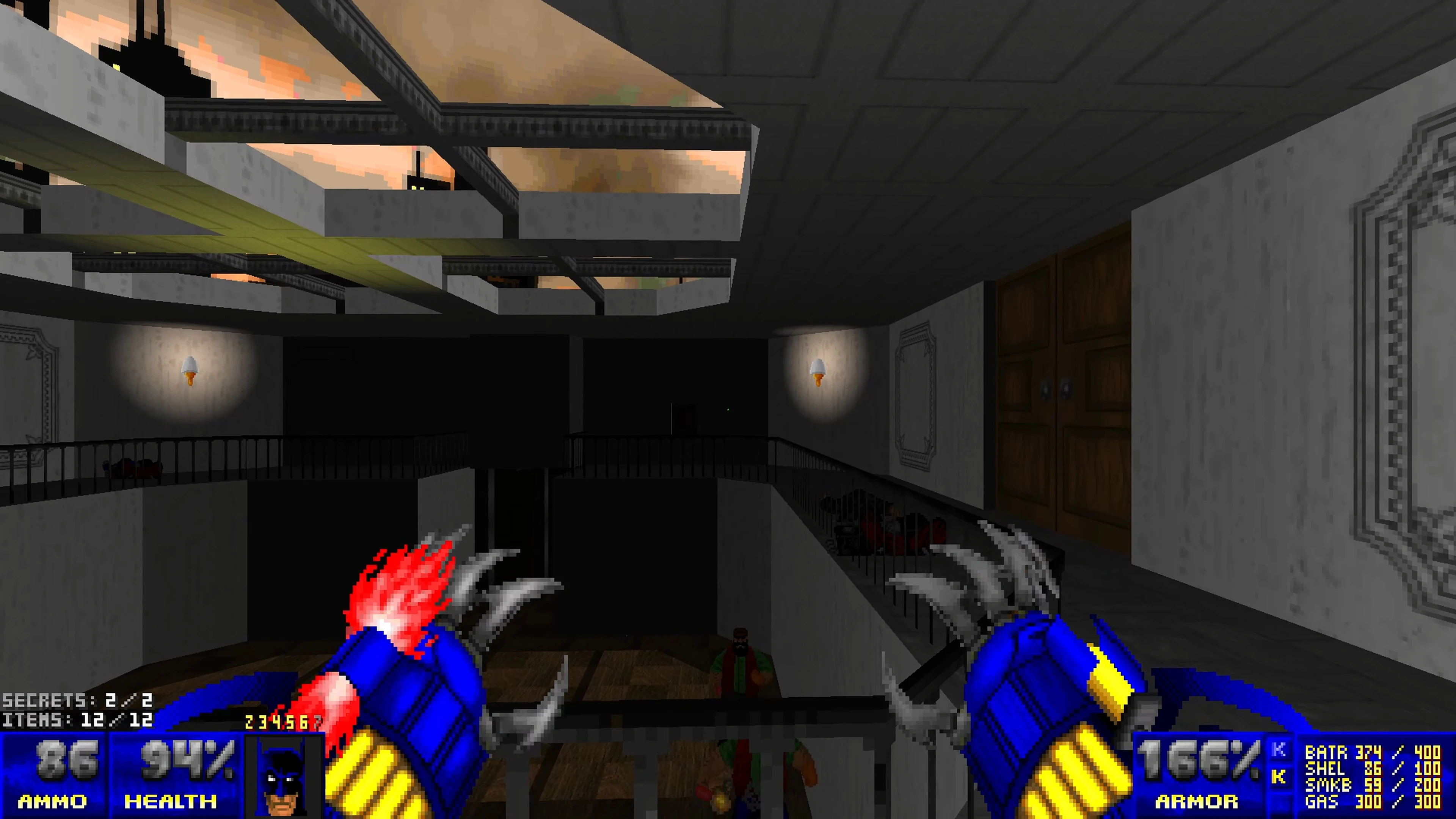 First-person view showing blue clawed hands in a dimly lit building corridor with a door and wall lamps