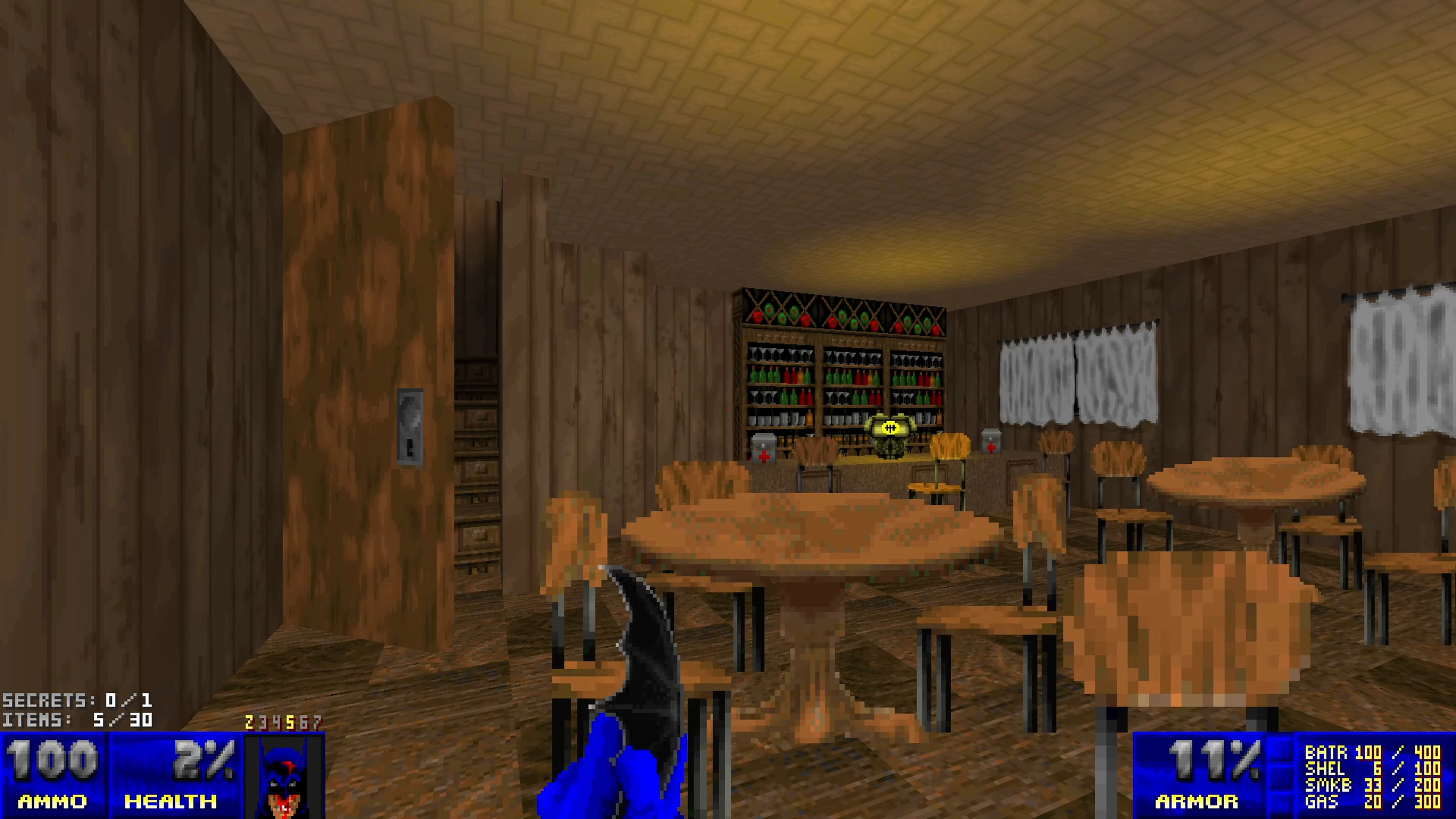 Screenshot from Batman Doom 1 Overhaul showing a wood-paneled bar with chairs, tables, health canisters, and in-game HUD