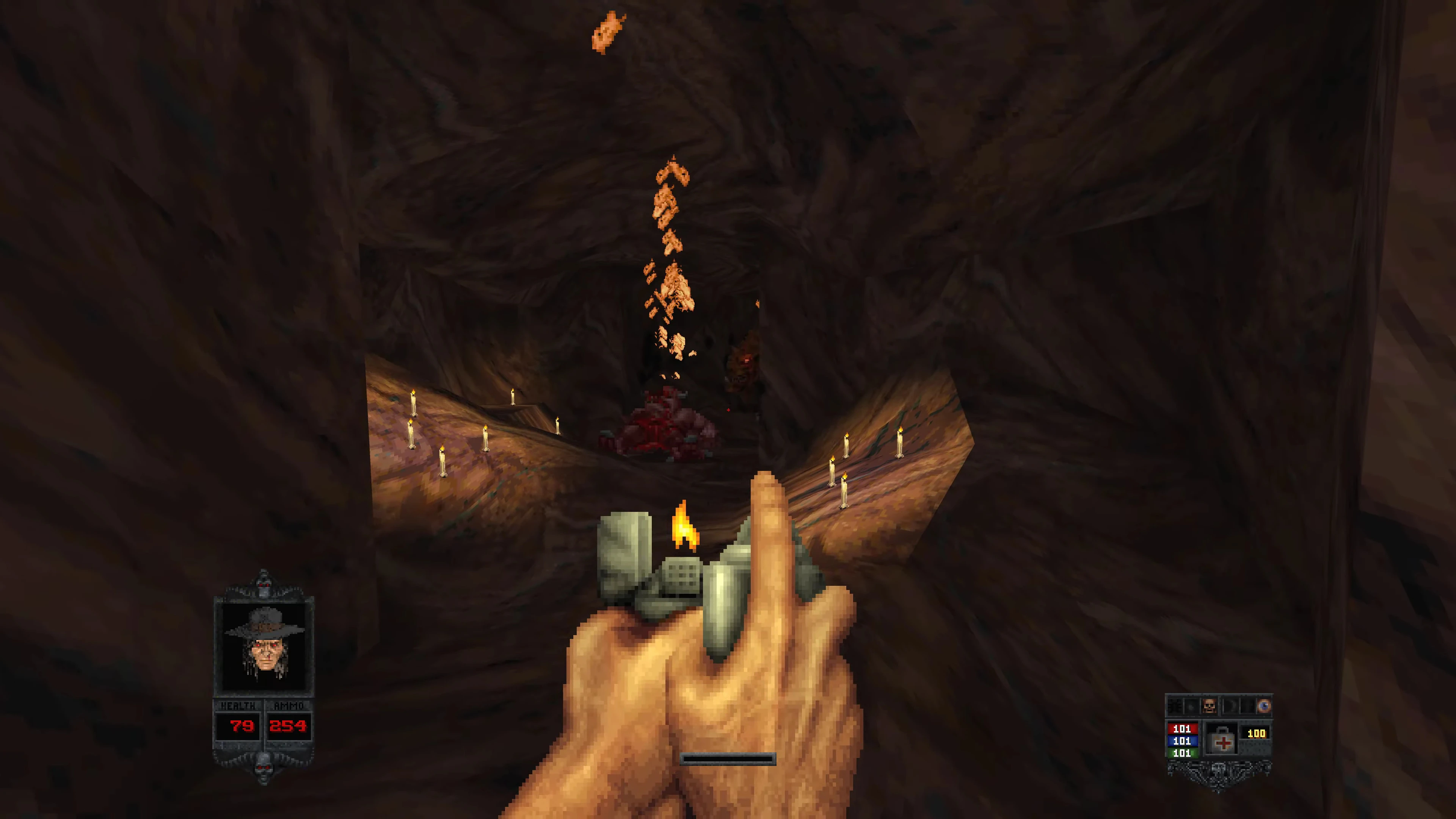 Гравець стріляє з пістолета у темному печерному тунелі зі свічками на стінах і ворогами попереду в моді Bloom для Doom II