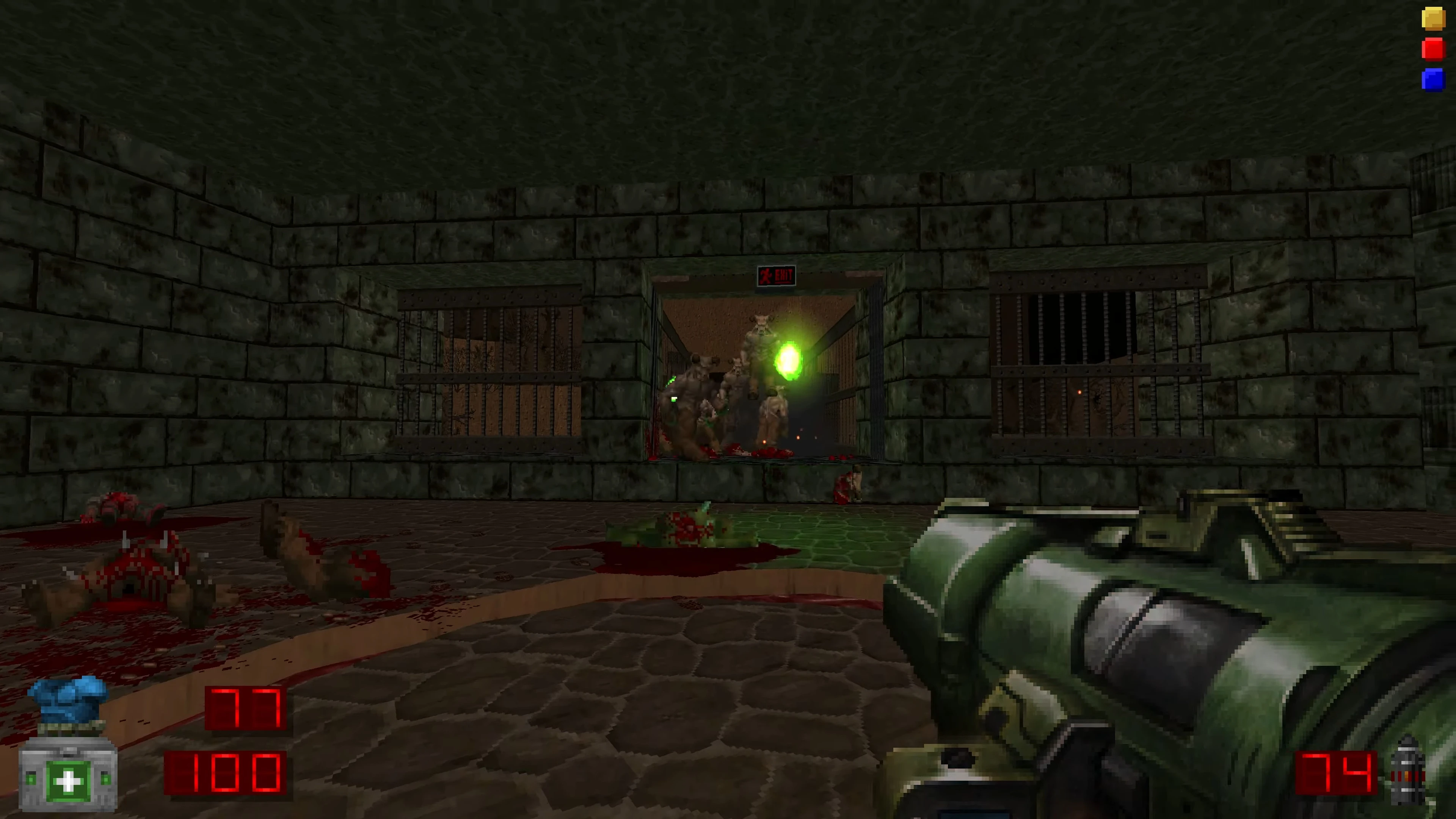First-person view shooting demons with rocket launcher in dark stone room with blood and gore
