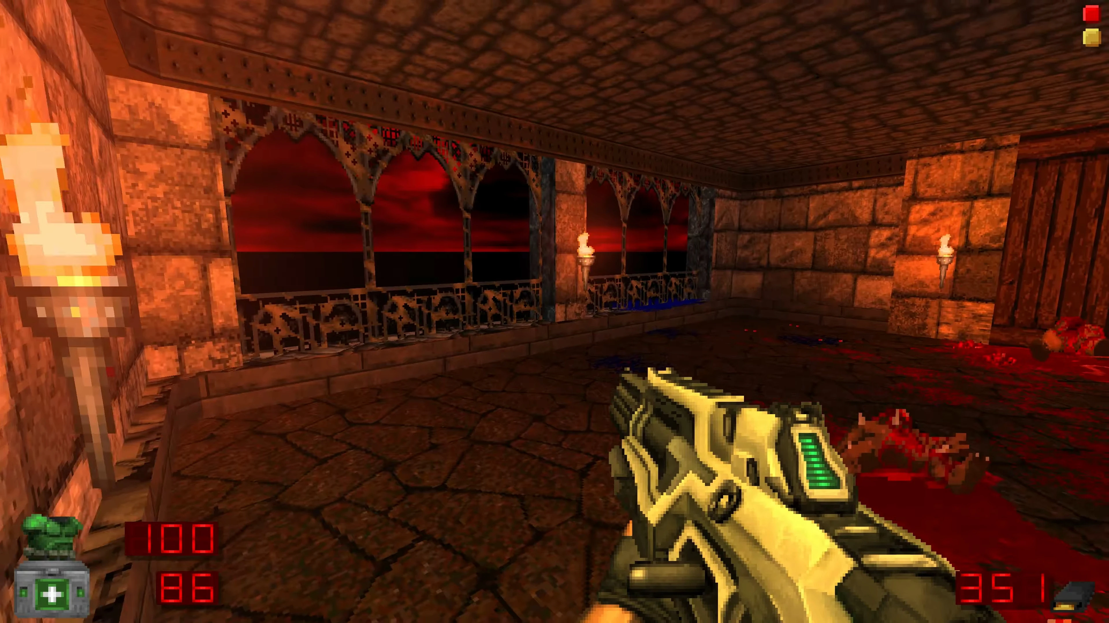 First-person view in Brutal Doom mod showing gothic castle interior with stone walls and torches