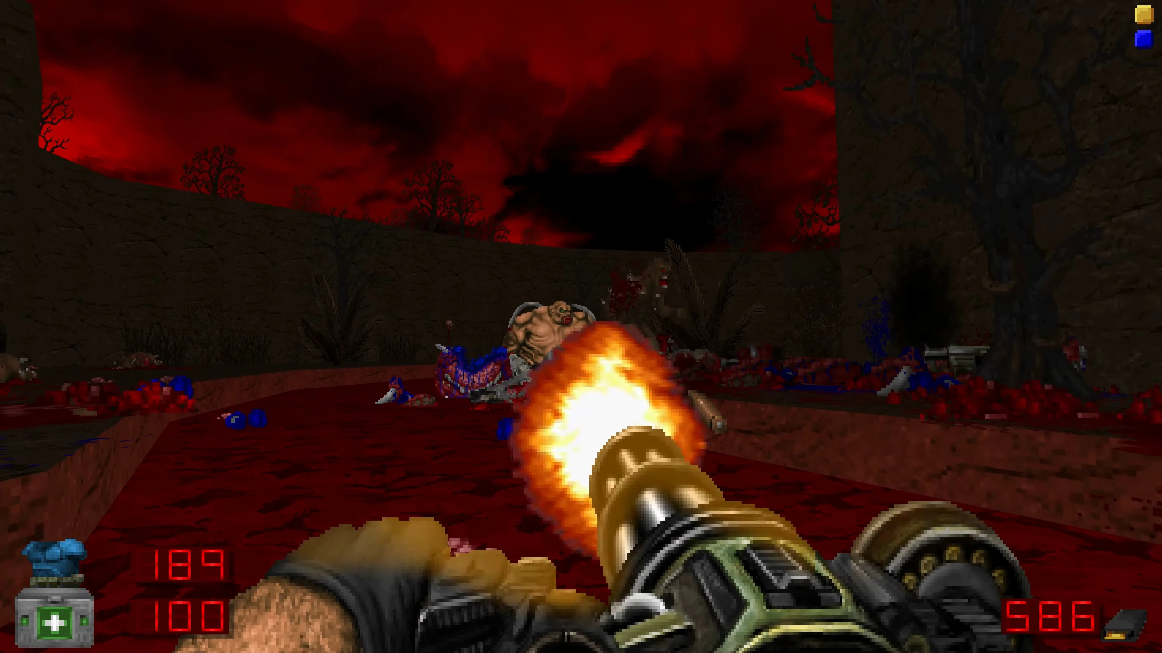 First-person view firing a large gun at a grotesque demon in a blood-red outdoor arena under ominous dark red sky