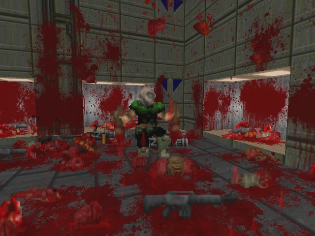 Screenshot showing intense blood splatter and gore from Brutal Doom mod in Doom II