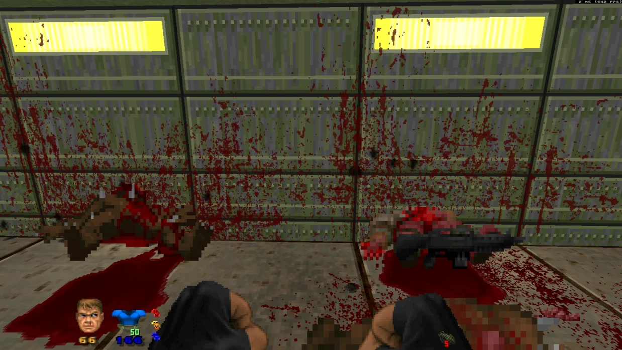 Screenshot of intense Bloody combat scene in Doom II with Brutal Doom mod showing blood splatters and enemy corpses