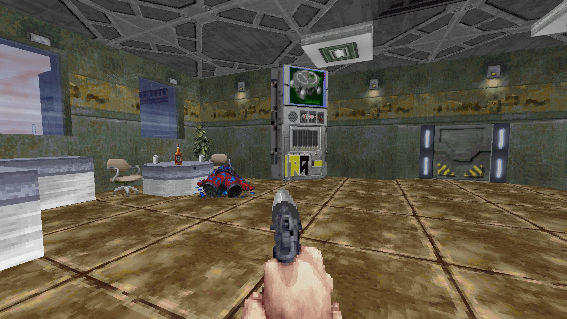 First-person view of a player holding a pistol inside a metal room with a table, chairs, and a vending machine in Doom II Dirty Pair Mod