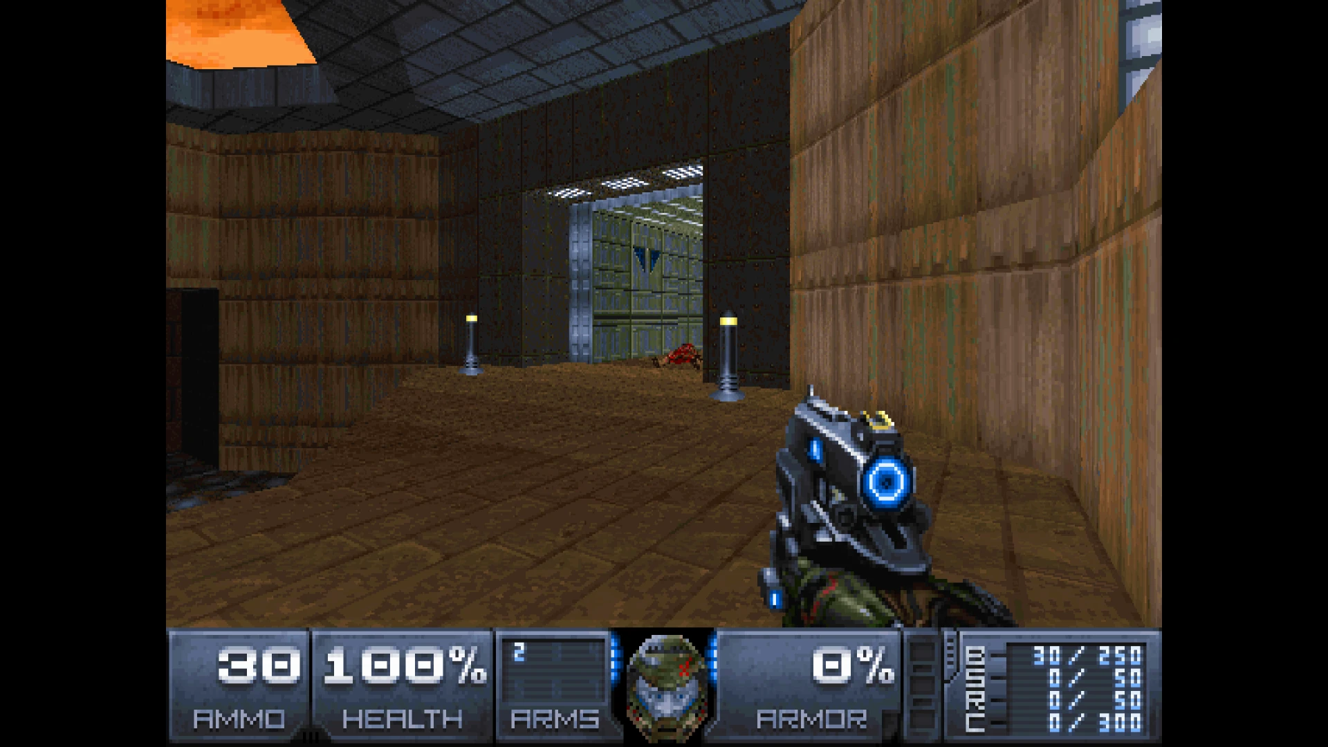 Vista en primera persona en mod DOOM 4 VANILLA de Doom II con pistola futurista y HUD de munición y salud