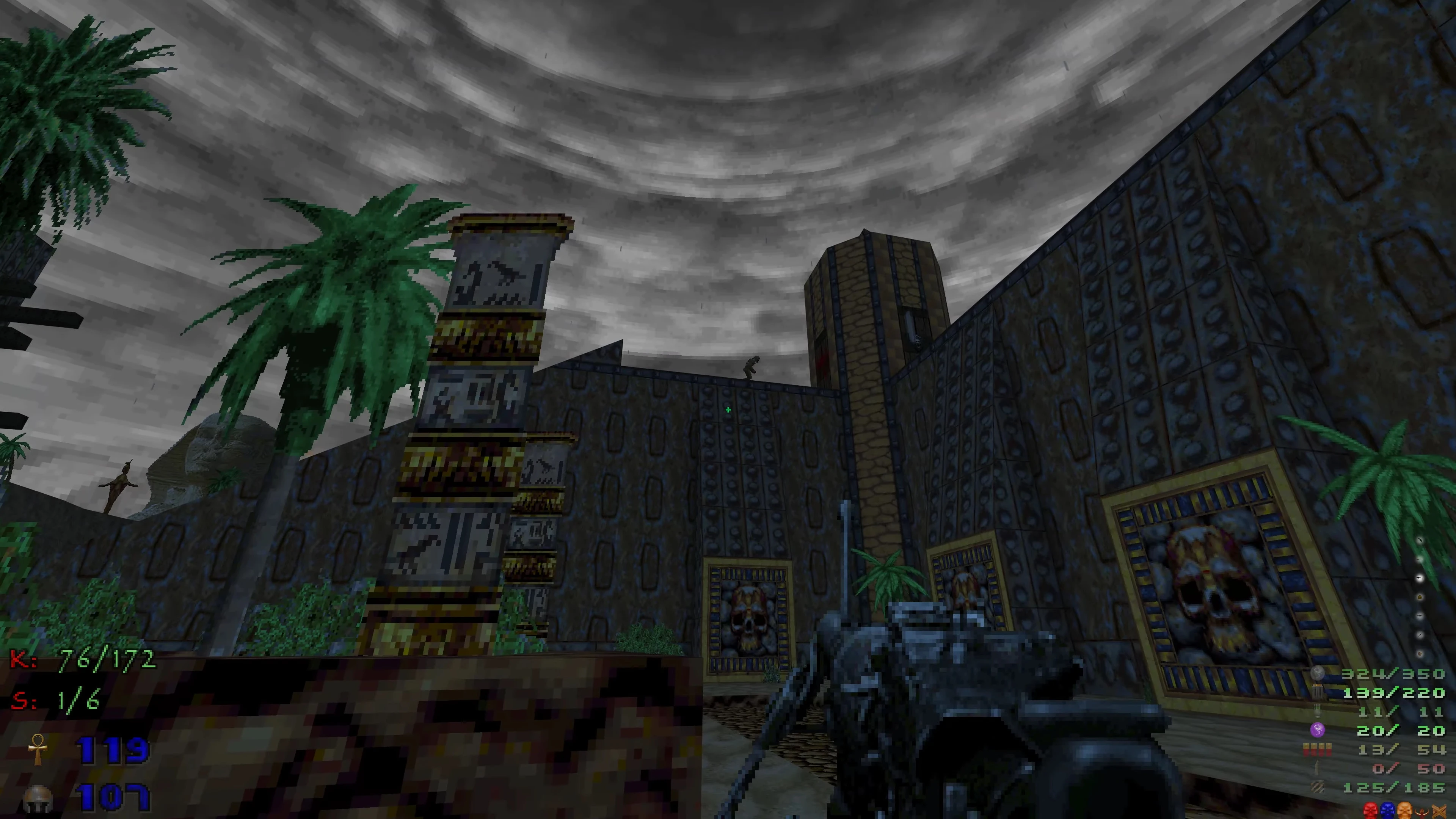 In-game screenshot showing an ancient Egyptian fortress environment with palm trees and cloudy sky in DoomExhumed mod