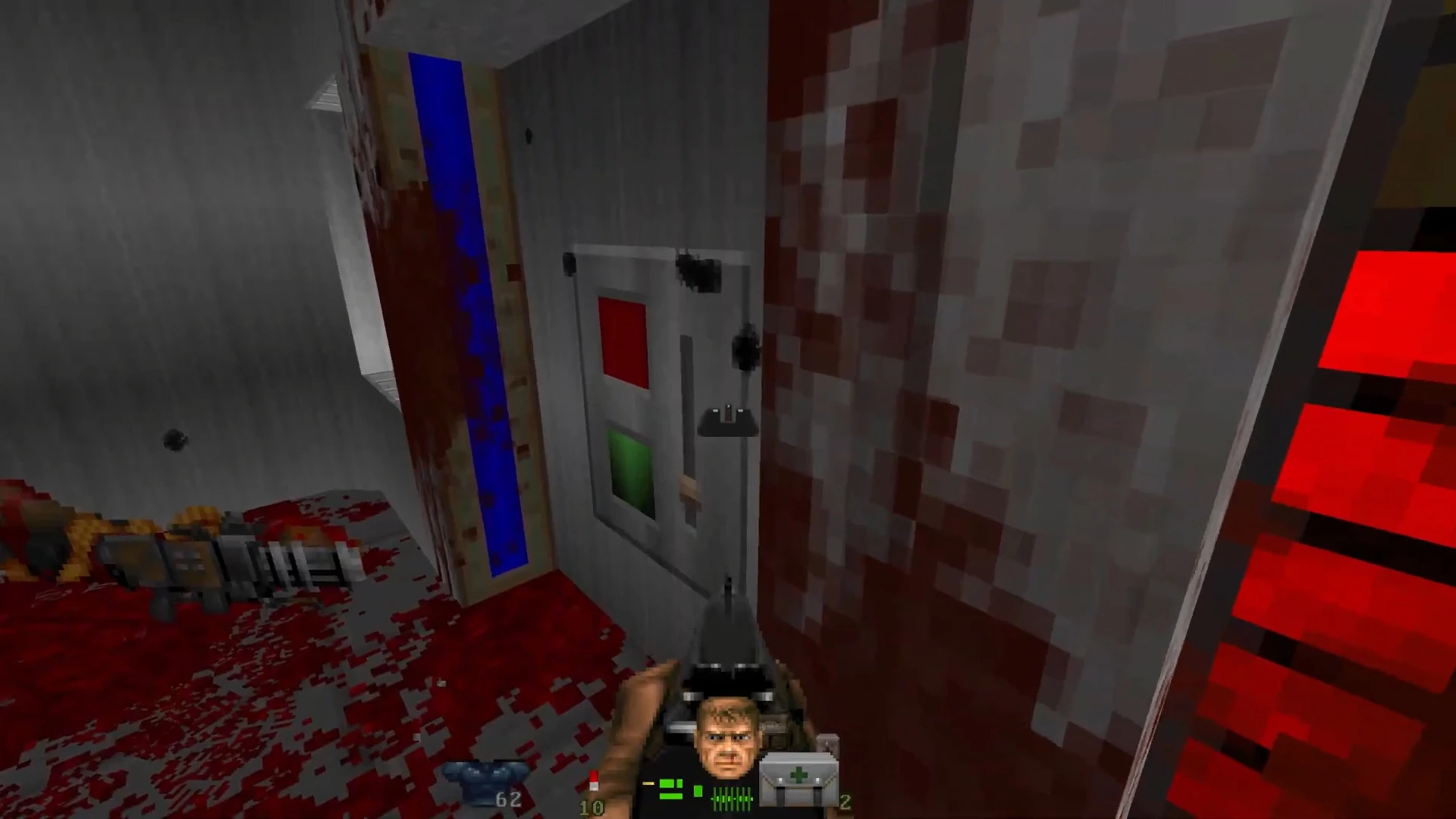 First-person view of Doom II gameplay showing a blood-splattered corridor and weapon ready to fire