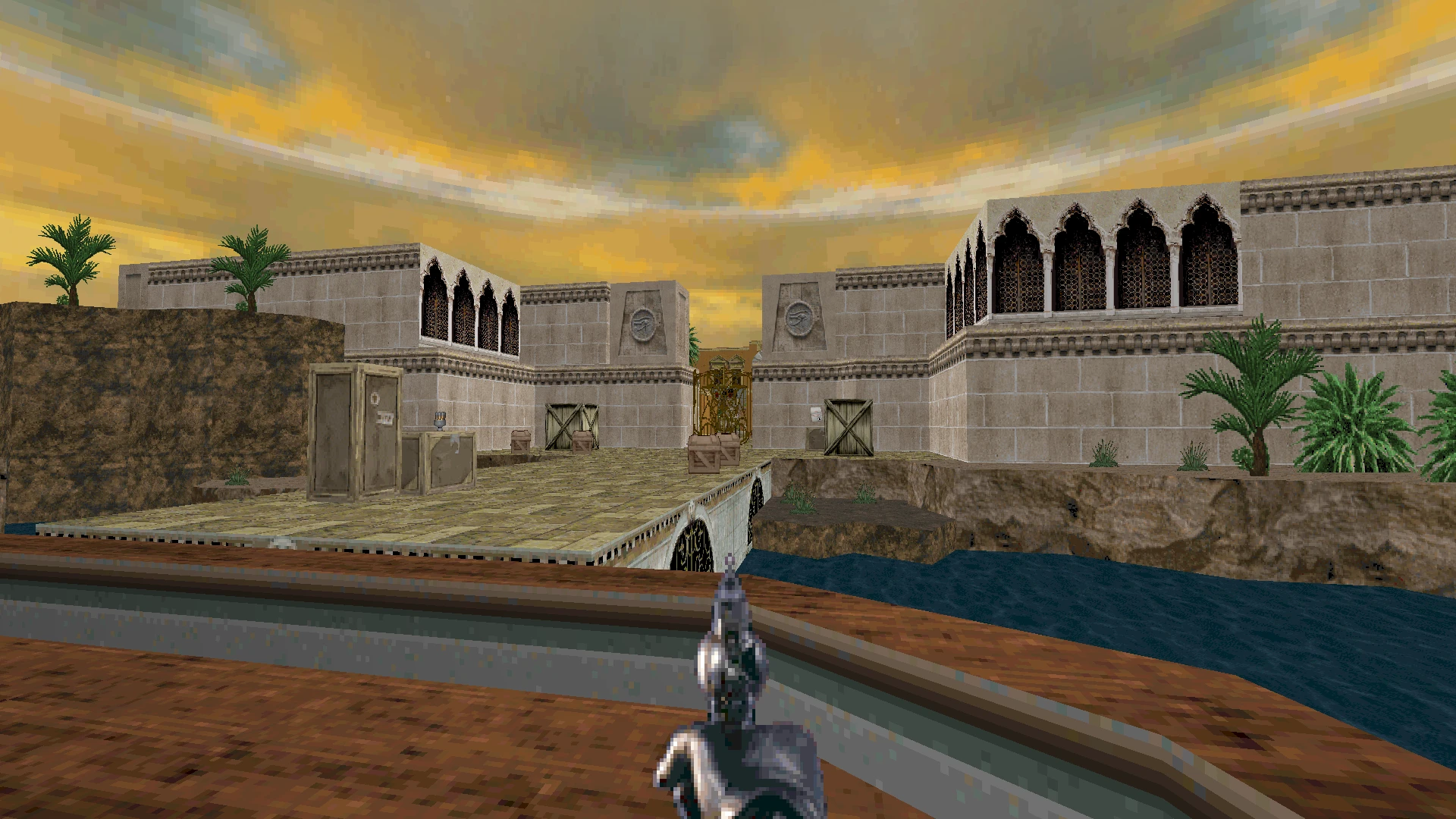 Игрок прицеливается из пистолета на древнеегипетский храм в моде Mask of Sobek для Doom II