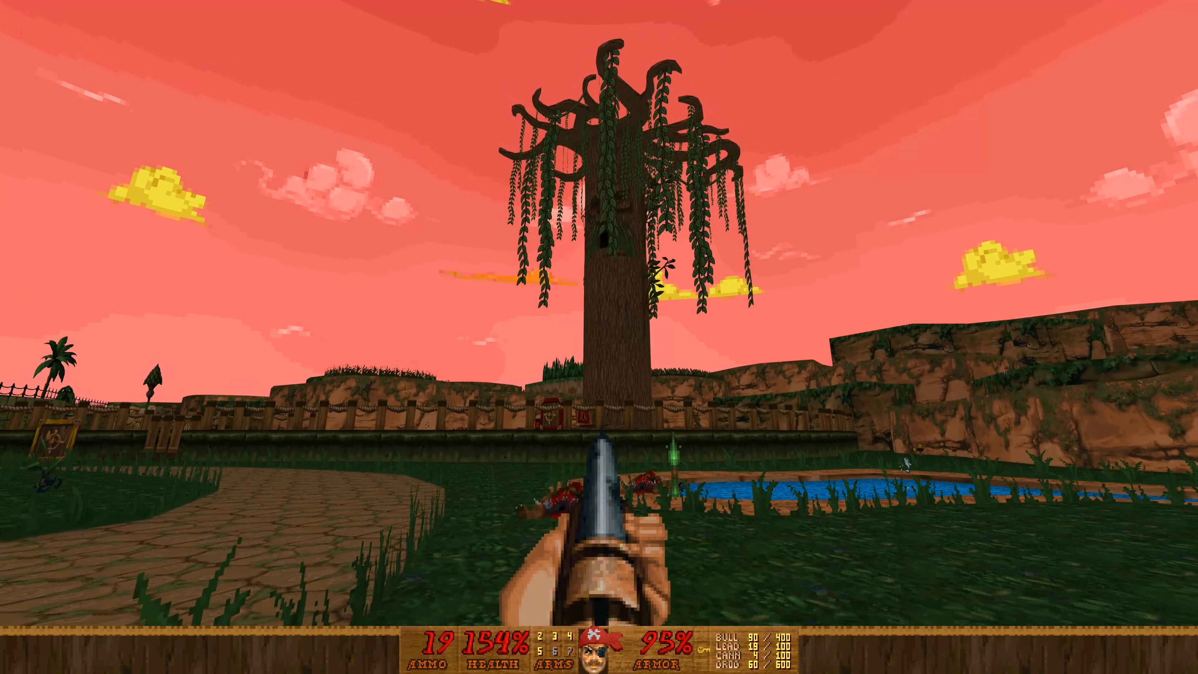 First-person view of a shotgun aimed at a large hanging vine tree against a pink sky in Pirate Doom 2