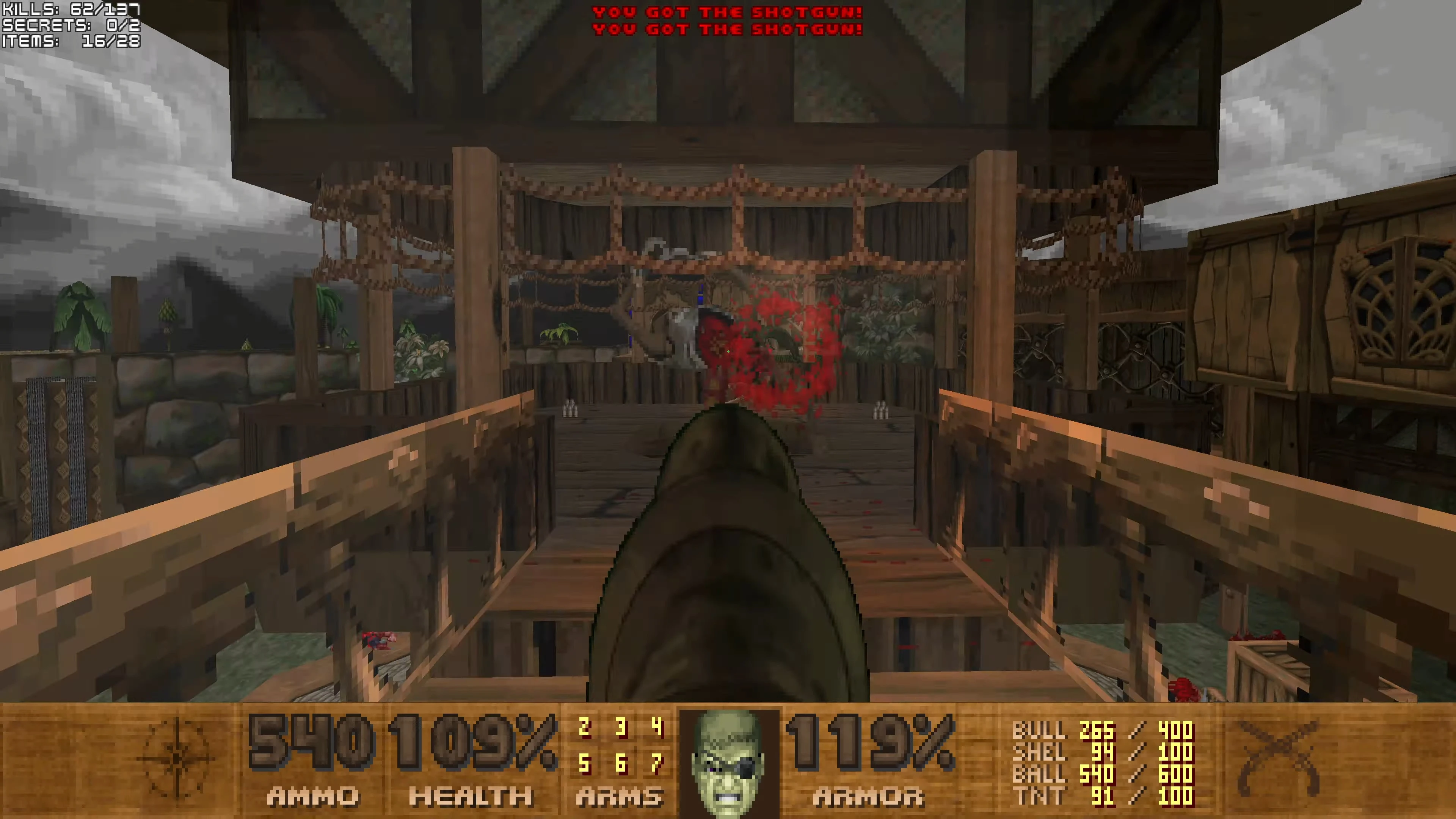 First-person view of shotgun firing at an enemy on a wooden pirate-style fortress level in Doom II Pirate Doom mod