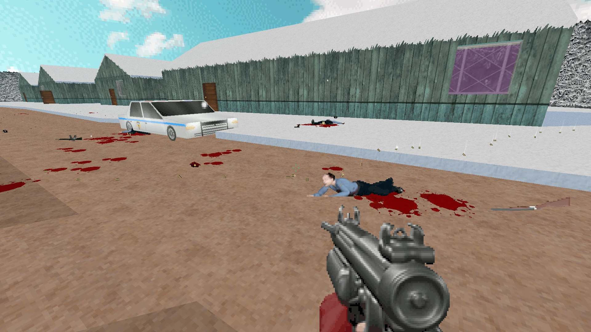 Vista en primera persona con arma pixelada apuntando a cuerpos ensangrentados y coche policial frente a casas nevadas