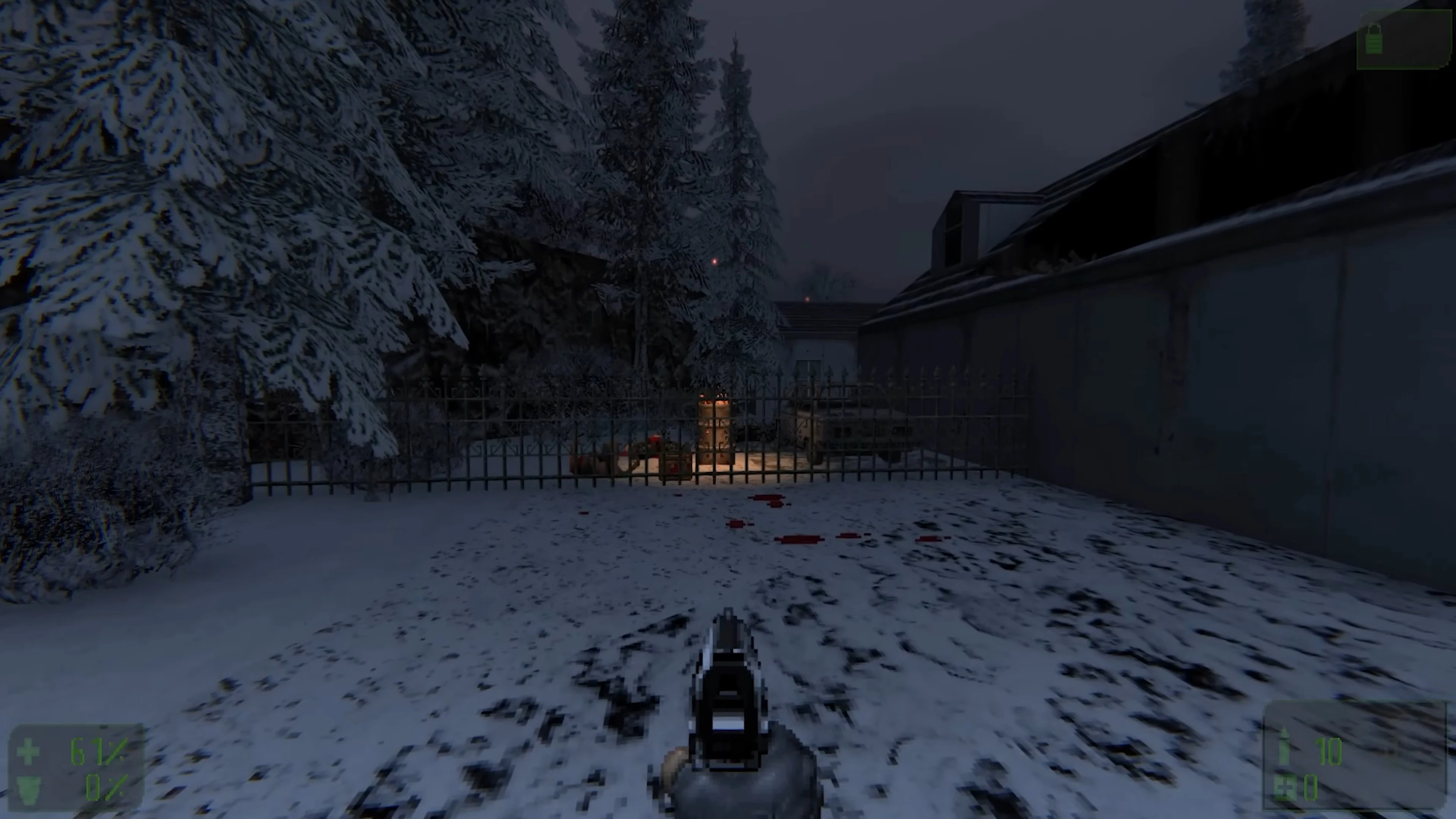 Player aiming a pistol on snow-covered ground near snowy trees and lit crates behind a fence at night