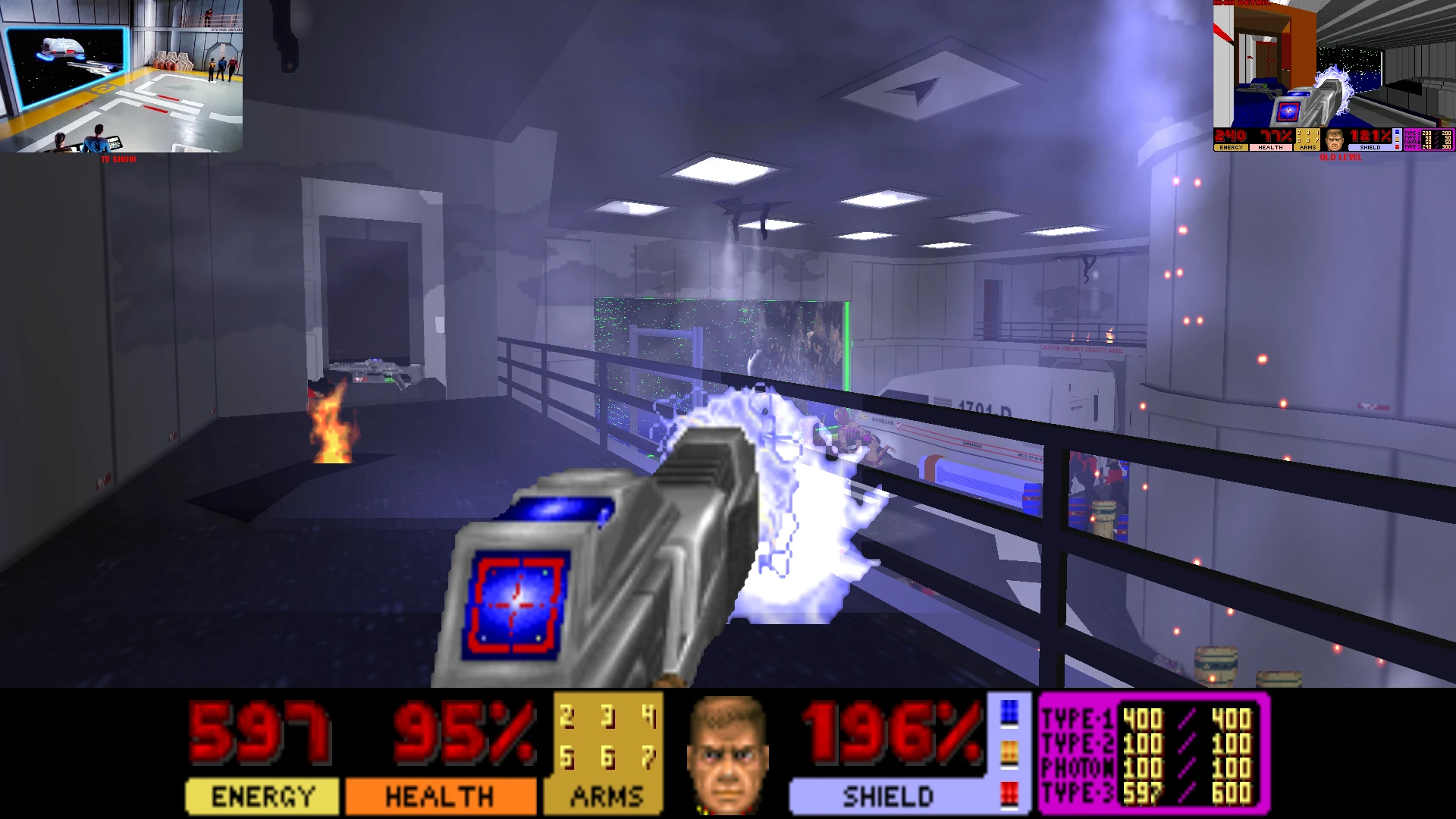 Gameplay screenshot showing futuristic weapon firing inside a sci-fi facility in Star Trek Doom Project mod