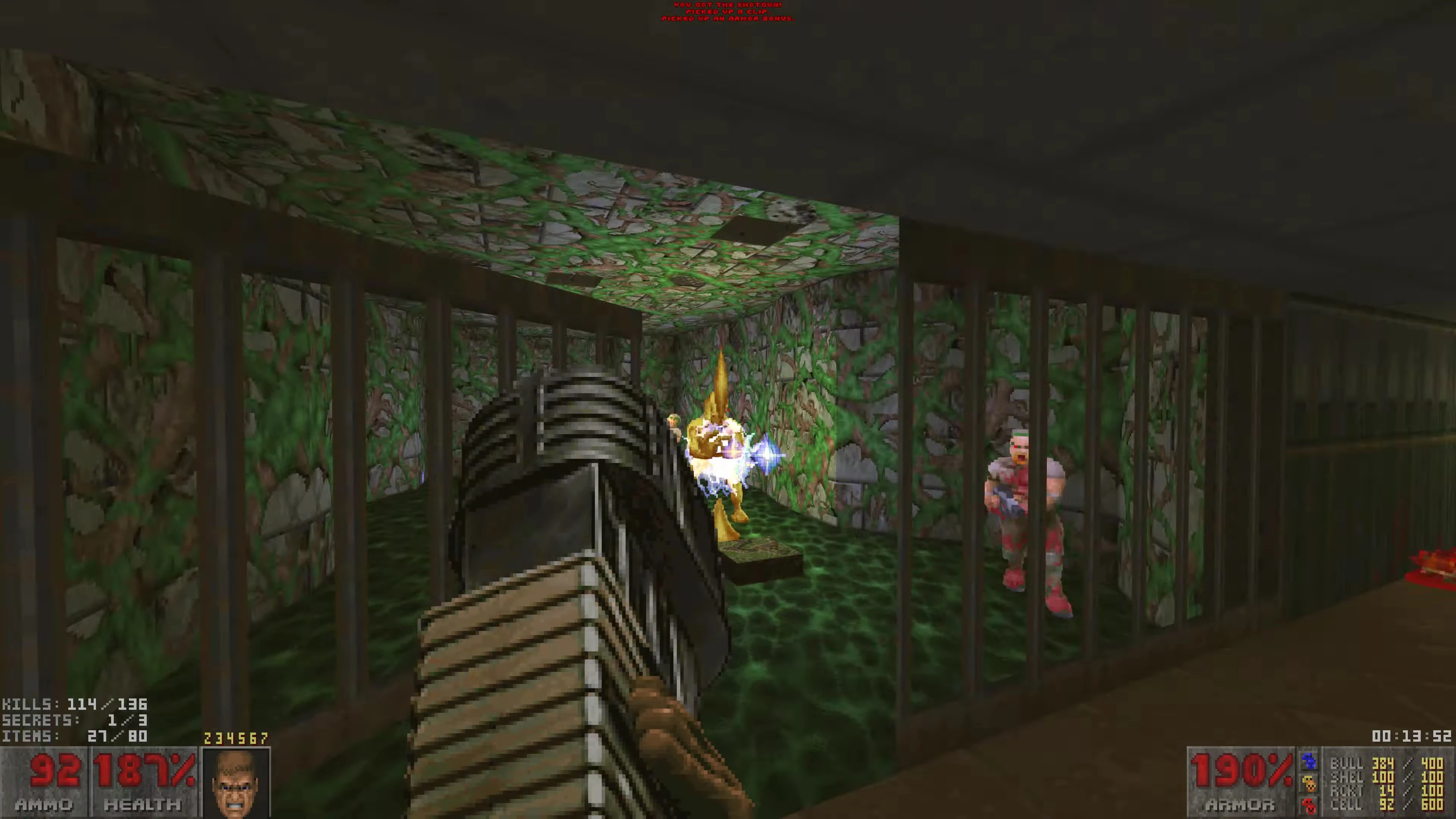 First-person view of shooting enemies behind jail bars in Doom II enhanced by Voxel Doom II mod