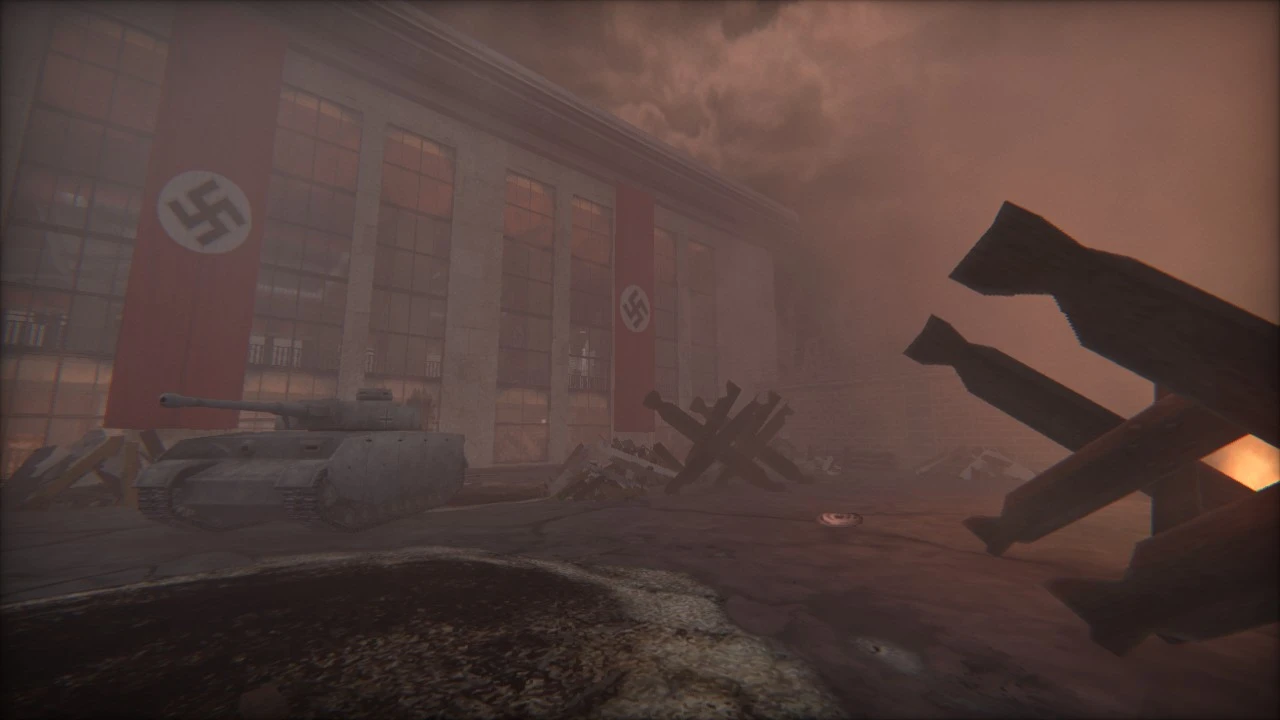 Captura de pantalla del juego que muestra un área urbana devastada por la guerra con un tanque y banderas nazis colgadas de un edificio