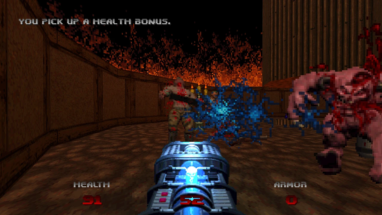 El jugador recoge un bono de salud mientras dispara plasma a los enemigos en una sala infernal – del mod Doom 64: Unseen Evil