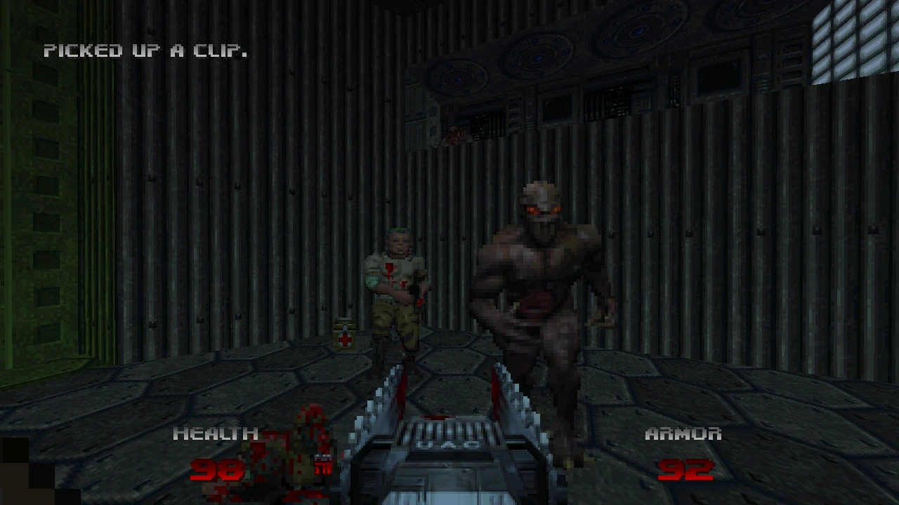 El jugador combate enemigos en un pasillo metálico con una ametralladora – del mod Doom 64: Unseen Evil para Doom