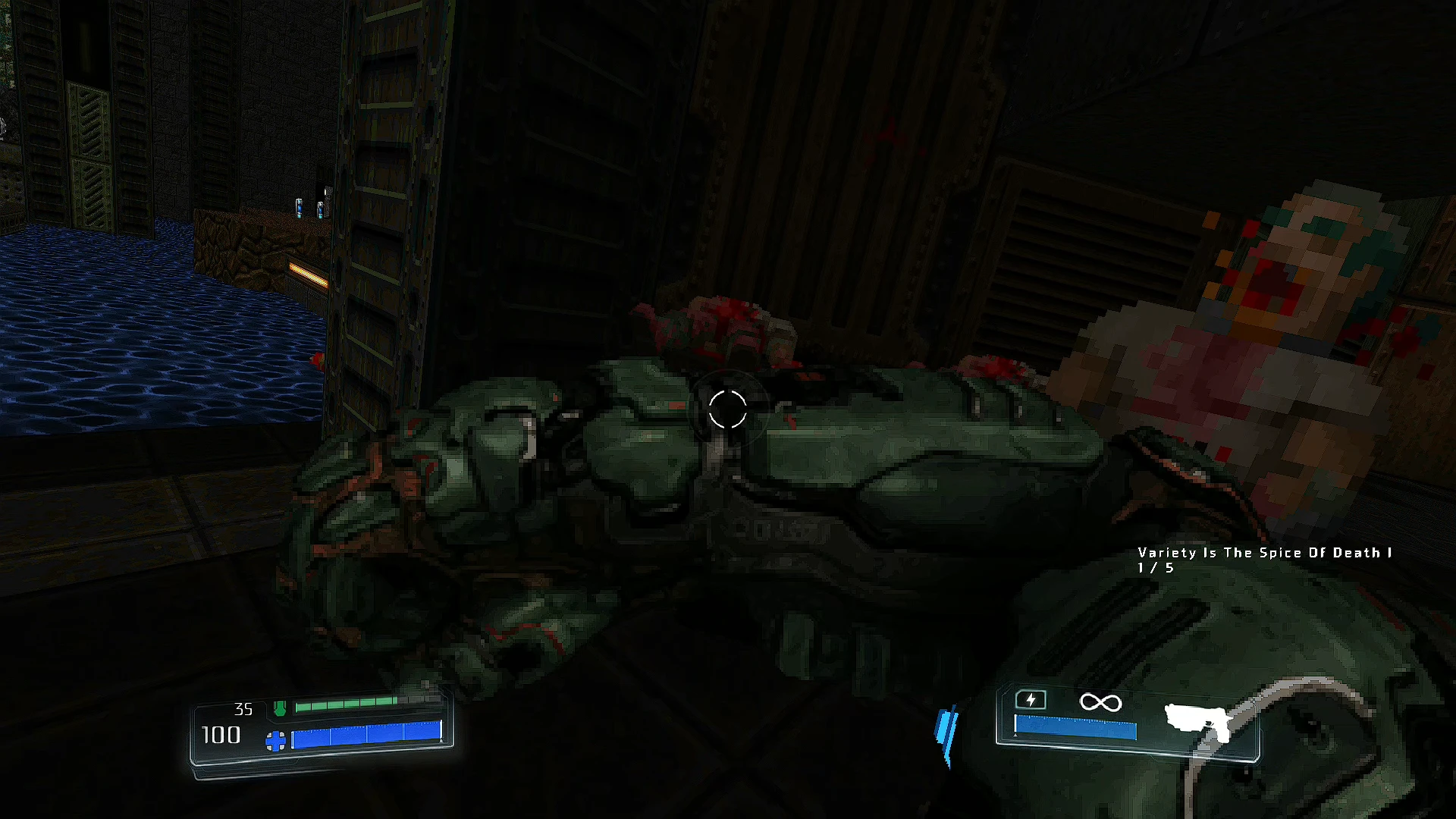 Doom mod Embers Of Armageddon screenshot showing a heavy futuristic weapon and a pixelated enemy in a dark industrial environment
