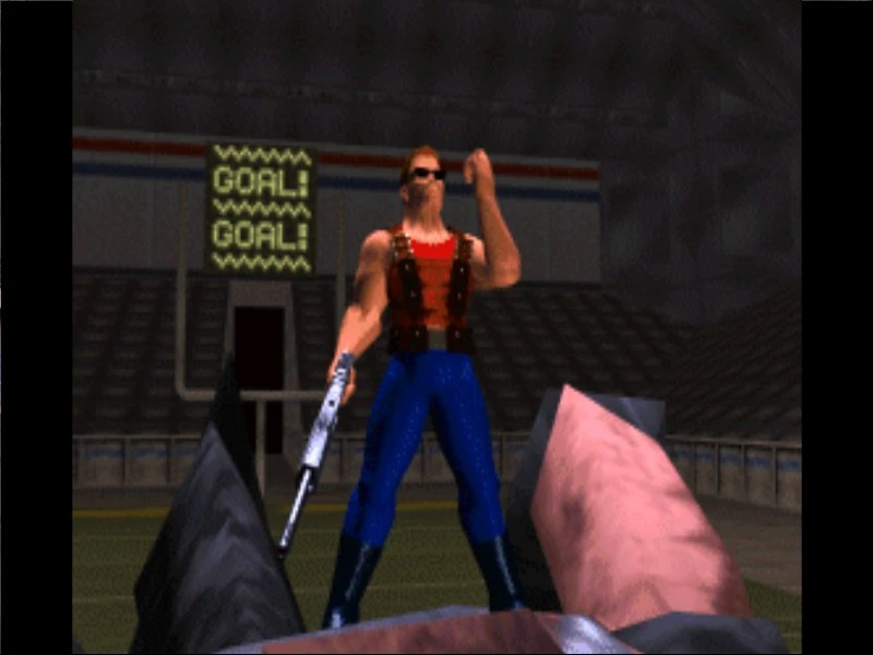Duke Nukem Charakter mit Sonnenbrille und rotem Tanktop mit Gewehr auf Sportplatz feiernd