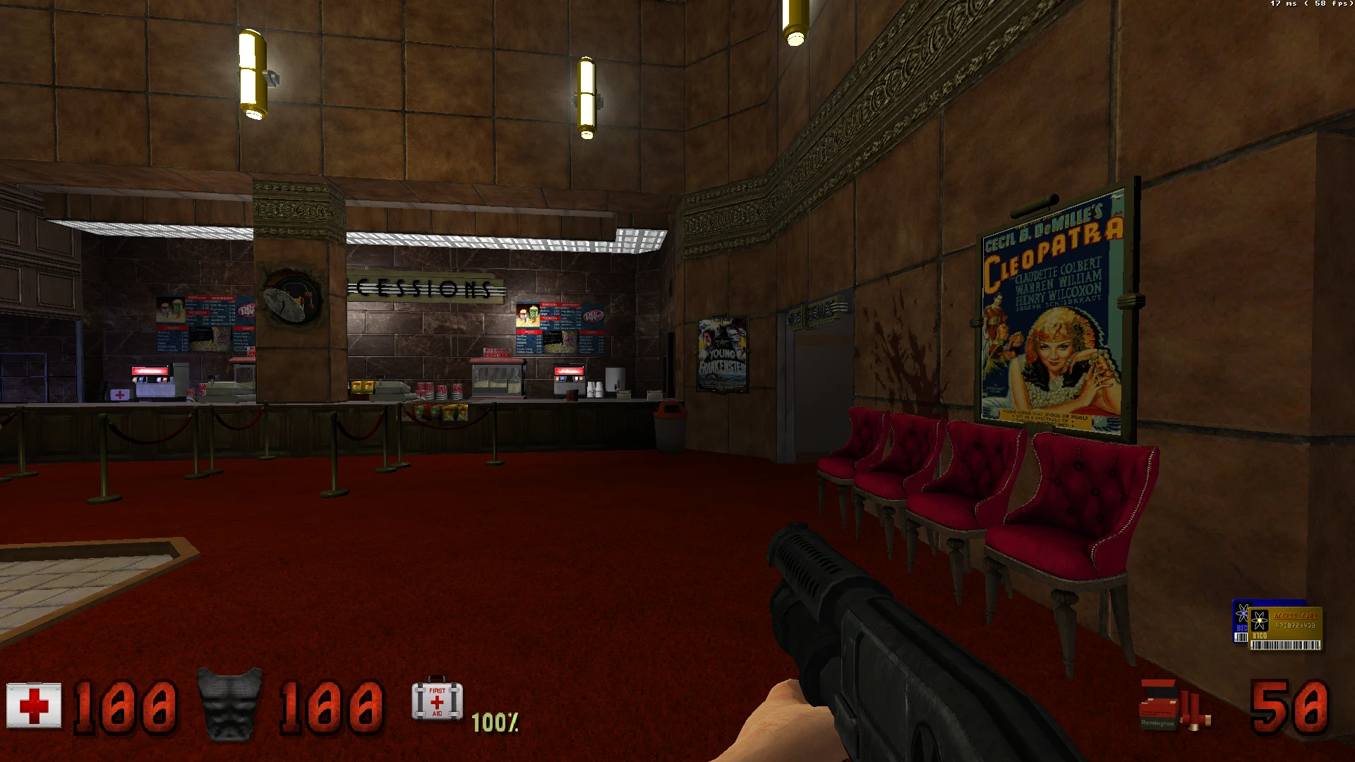 Spielbildschirm zeigt Kinokasse mit rotem Teppich und Vintage-Postern im Duke Nukem 3D-Mod