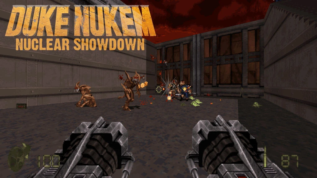Player firing dual chainguns at alien enemies in a dark industrial level of Duke Nukem 3D mod Nuclear Showdown