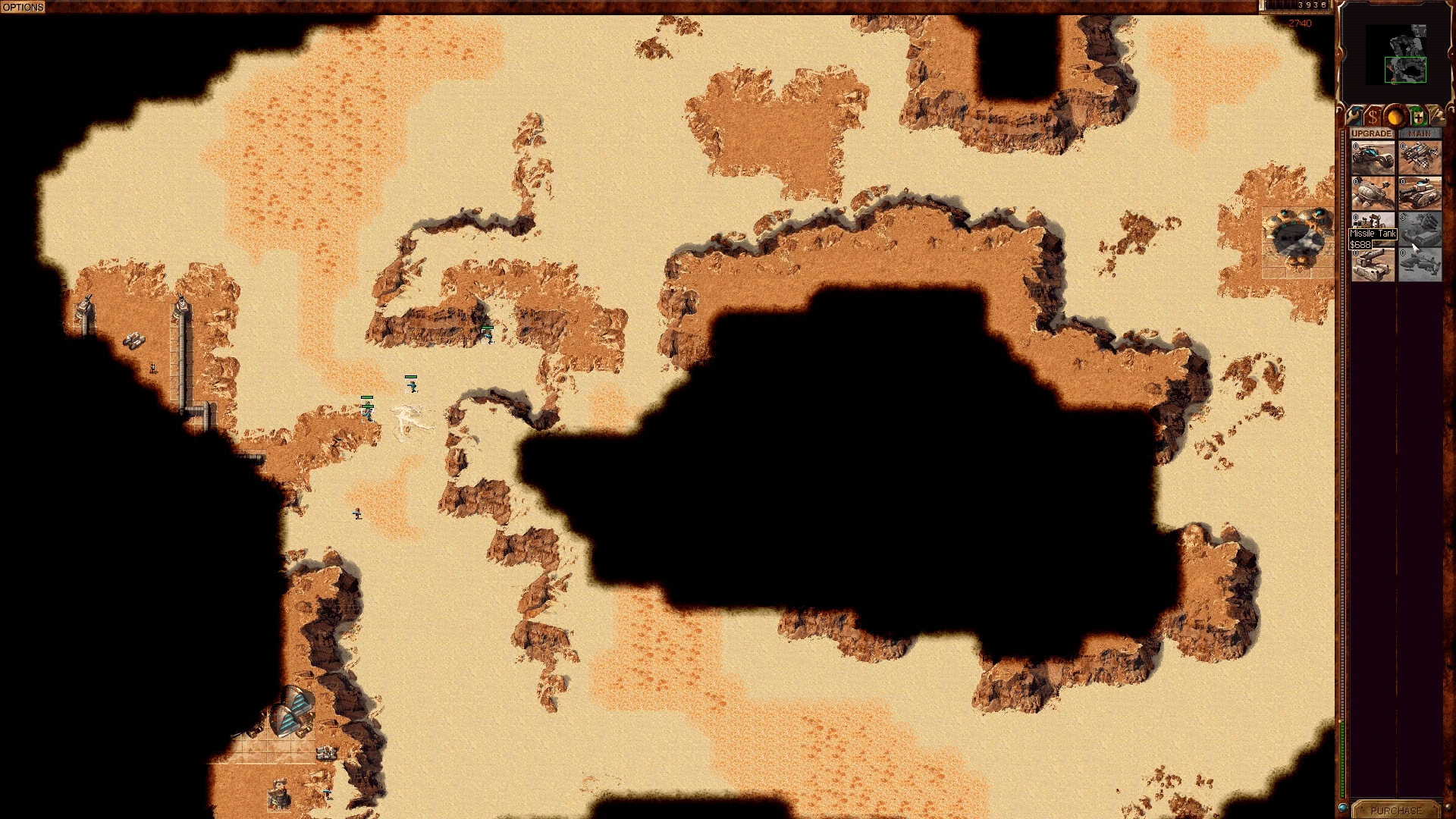 Draufsicht auf Wüstenkarte mit Klippen und kleinen Einheiten nahe Basis im Dune 2000 Mod