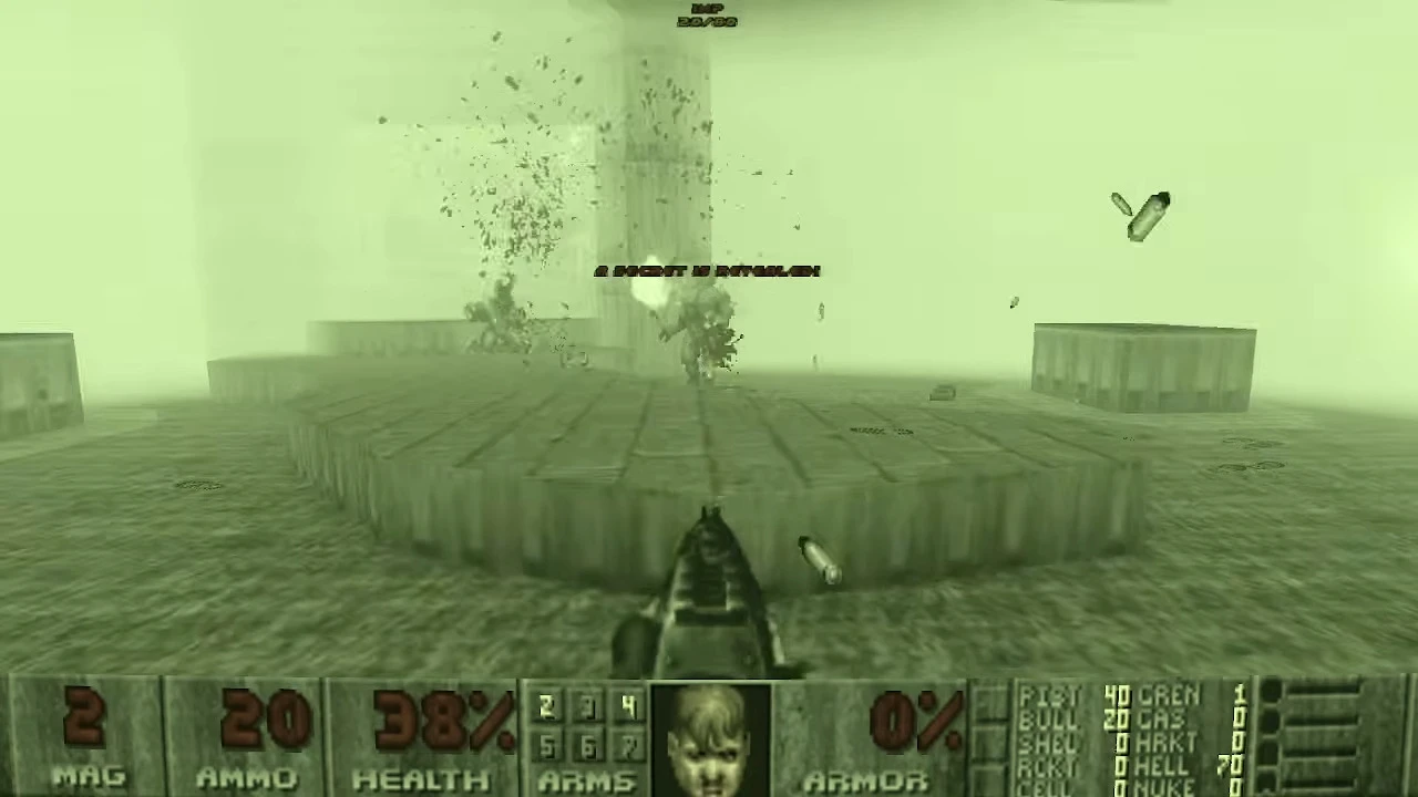 Green tinted first-person view of shooting enemies on a platform with HUD showing health and ammo in Doom 1993