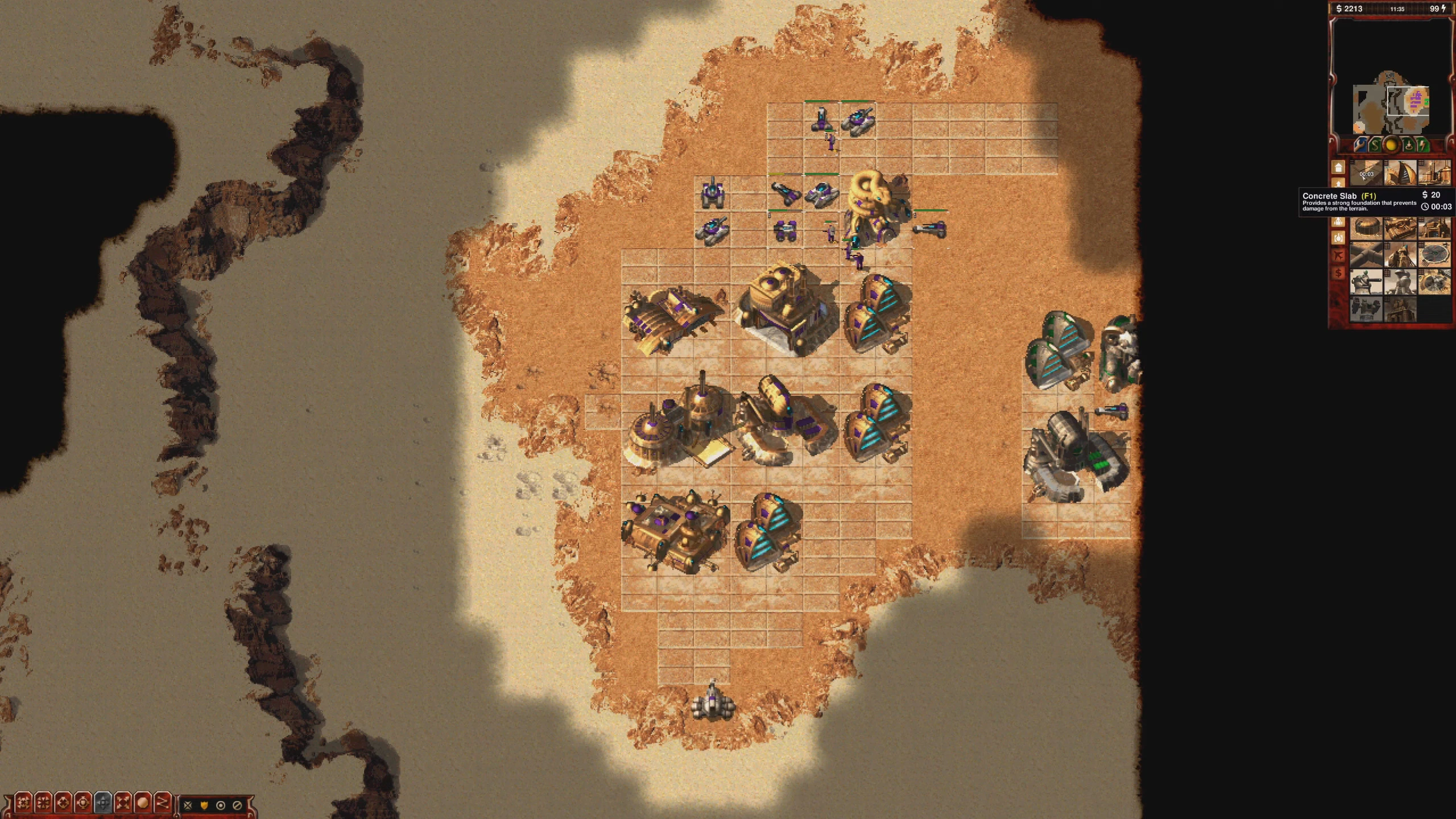 Widok z góry na pustynną bazę z budynkami i jednostkami w Command & Conquer Tiberian Dawn na silniku OpenRA