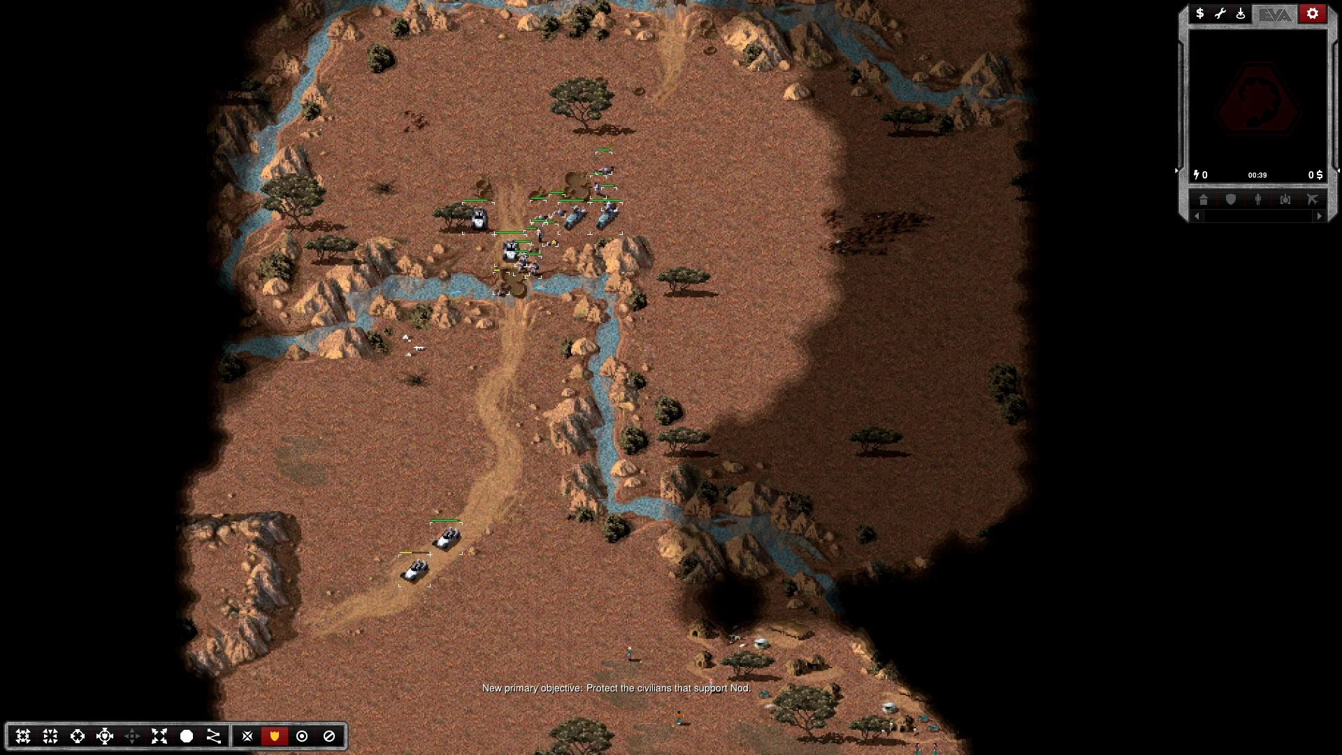 Widok z góry na jednostki wojskowe przekraczające rzekę na skalistym terenie w Command & Conquer Tiberian Dawn z silnikiem OpenRA