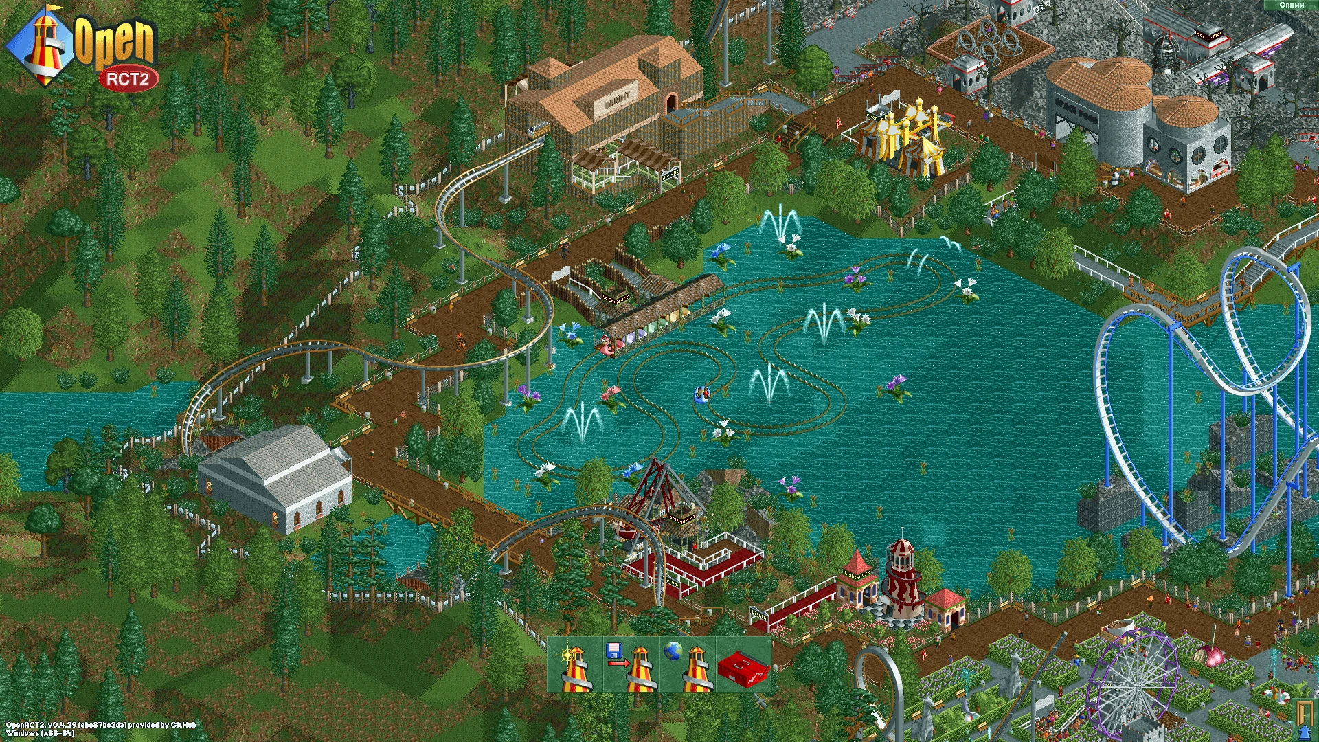 Zrzut ekranu z gry OpenRCT2 ukazujący jezioro z atrakcją wodną i kilkoma rollercoasterami otoczonymi drzewami i ścieżkami parku