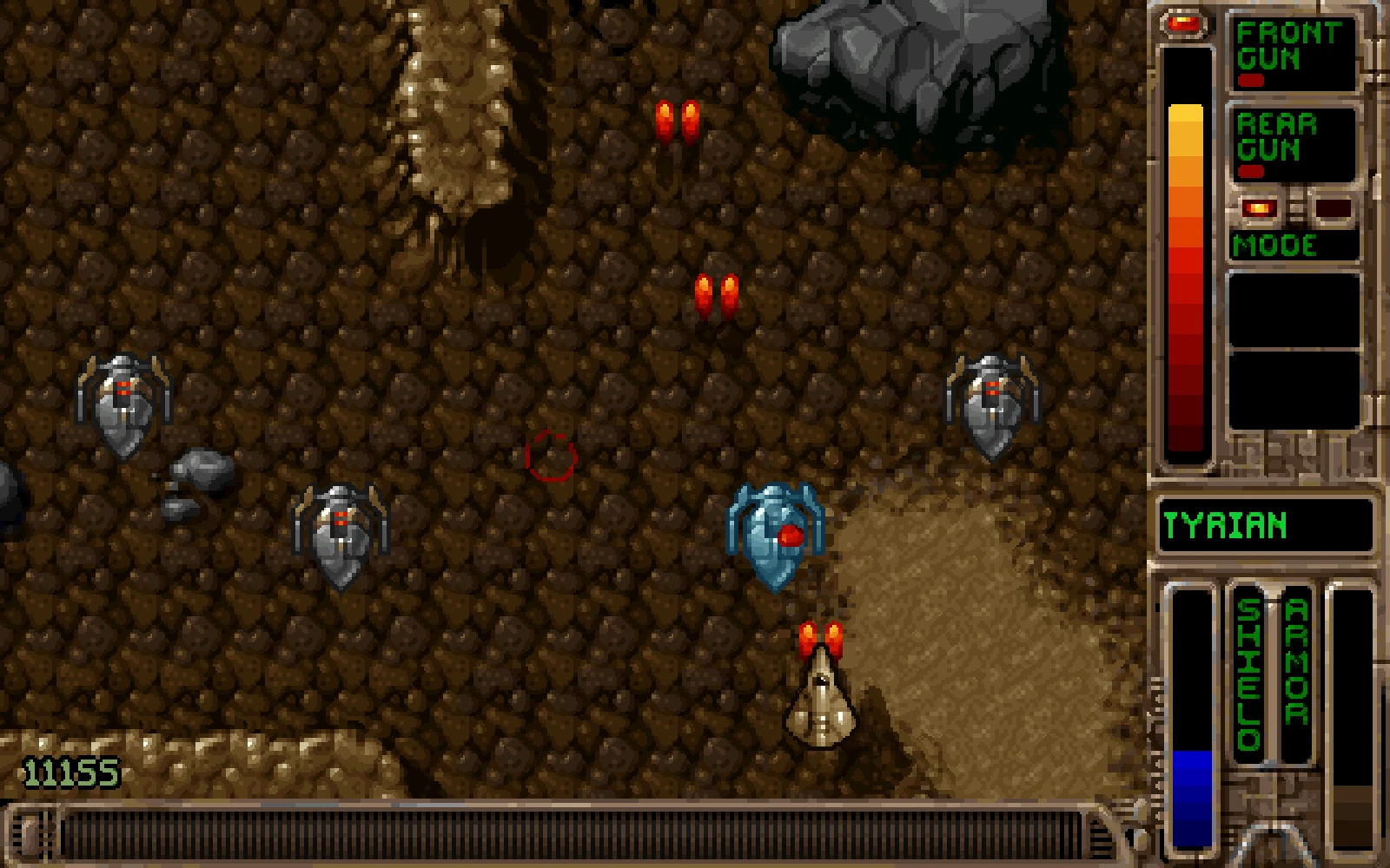 Vista aérea de juego de disparos pixelado mostrando nave del jugador disparando a naves enemigas sobre terreno rocoso