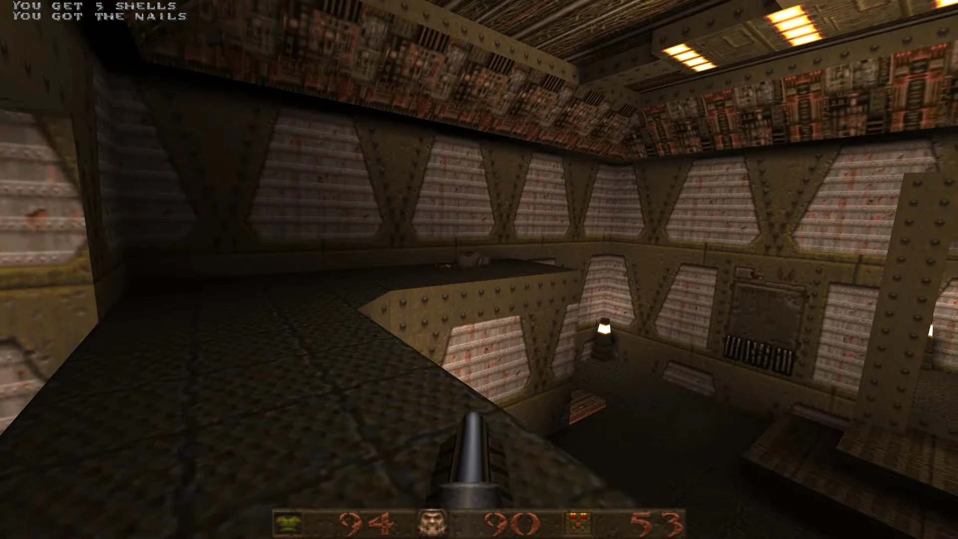Quake gameplay screenshot showing dark industrial metal room with shotgun ready using Quakespasm-Spiked engine
