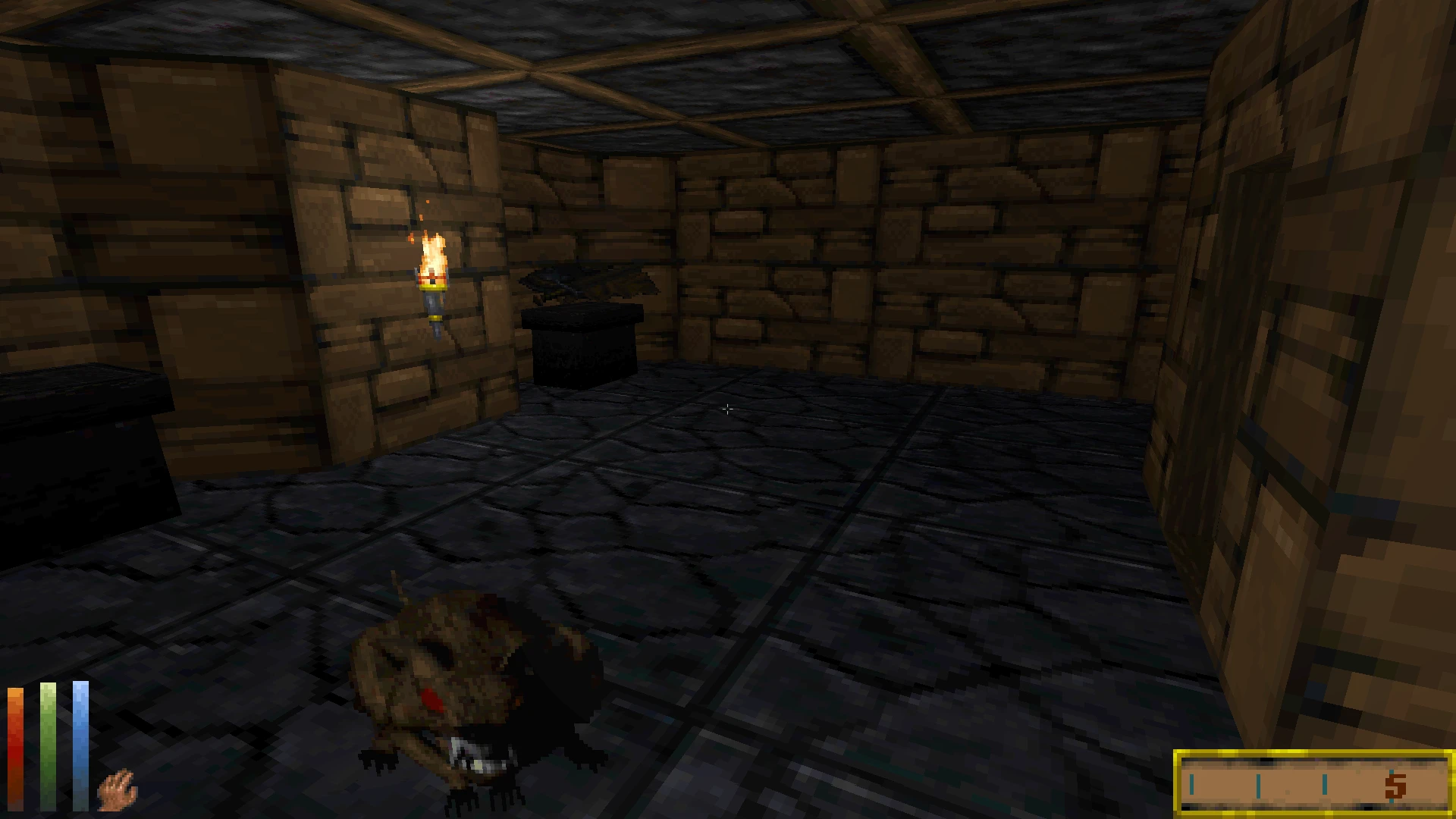 Interior of a stone dungeon with wooden beams, torch on wall, and a rat enemy on dark tiled floor