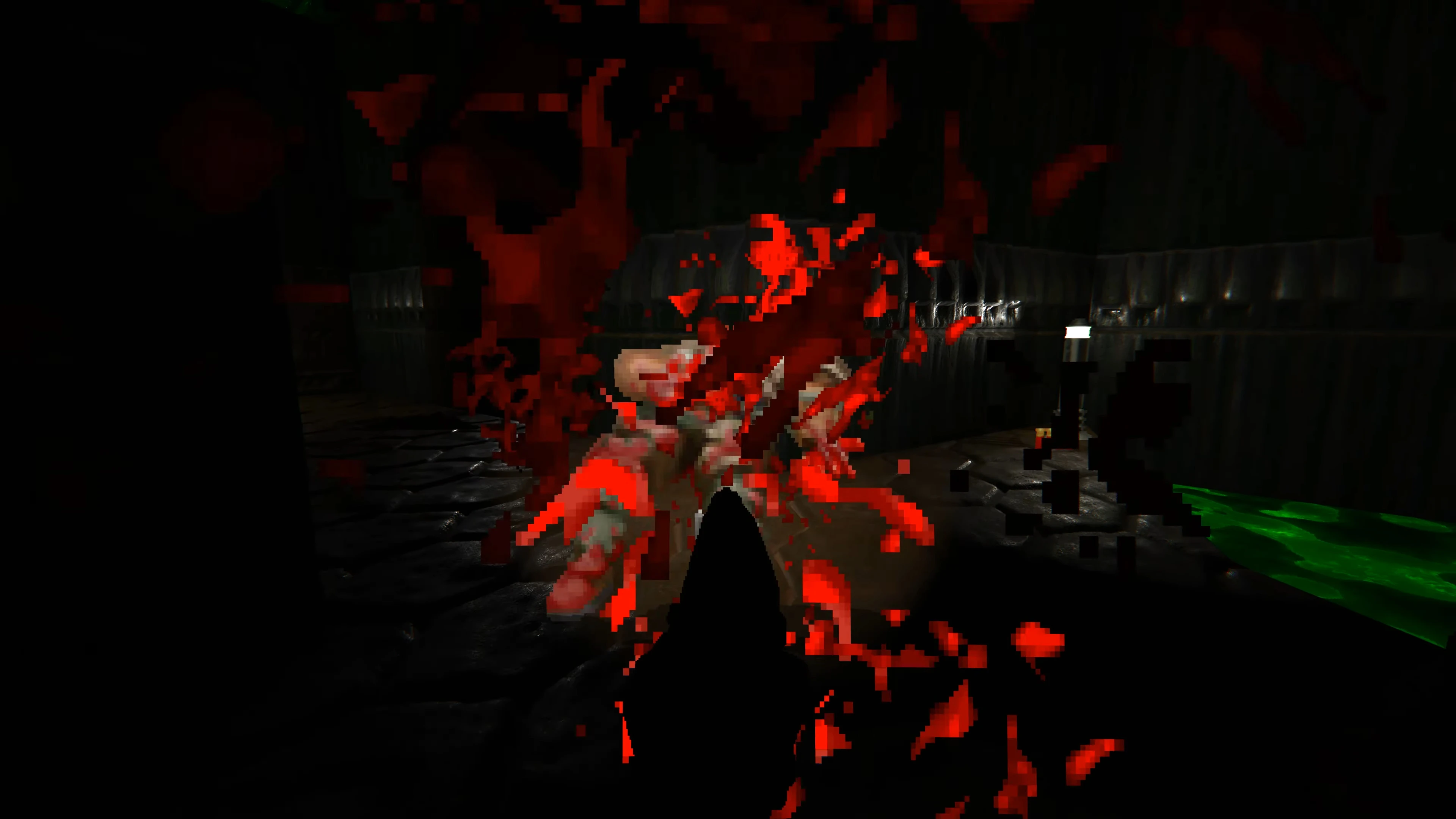 First-person screenshot from Doom 1993 using UZDoom showing a pixelated enemy shattered with bright red blood splatter