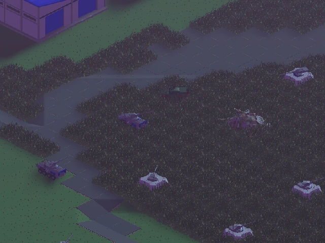 Widok z góry na czołgi rozmieszczone na polu bitwy w Command & Conquer: Generals, pokazujący strategiczne rozmieszczenie.