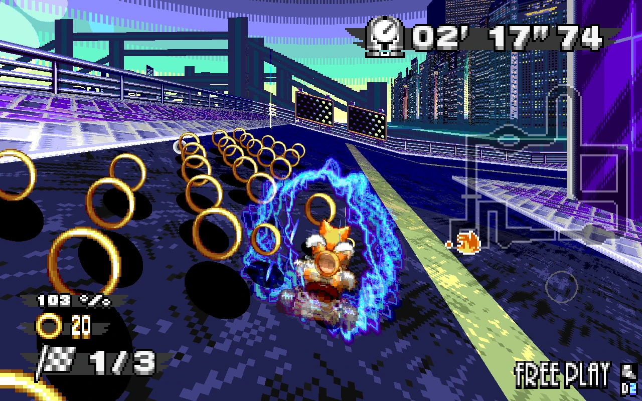 Tails ścigający się po futurystycznym torze miejskim otoczonym złotymi pierścieniami w fanowskiej grze Sonic Robo Blast 1998